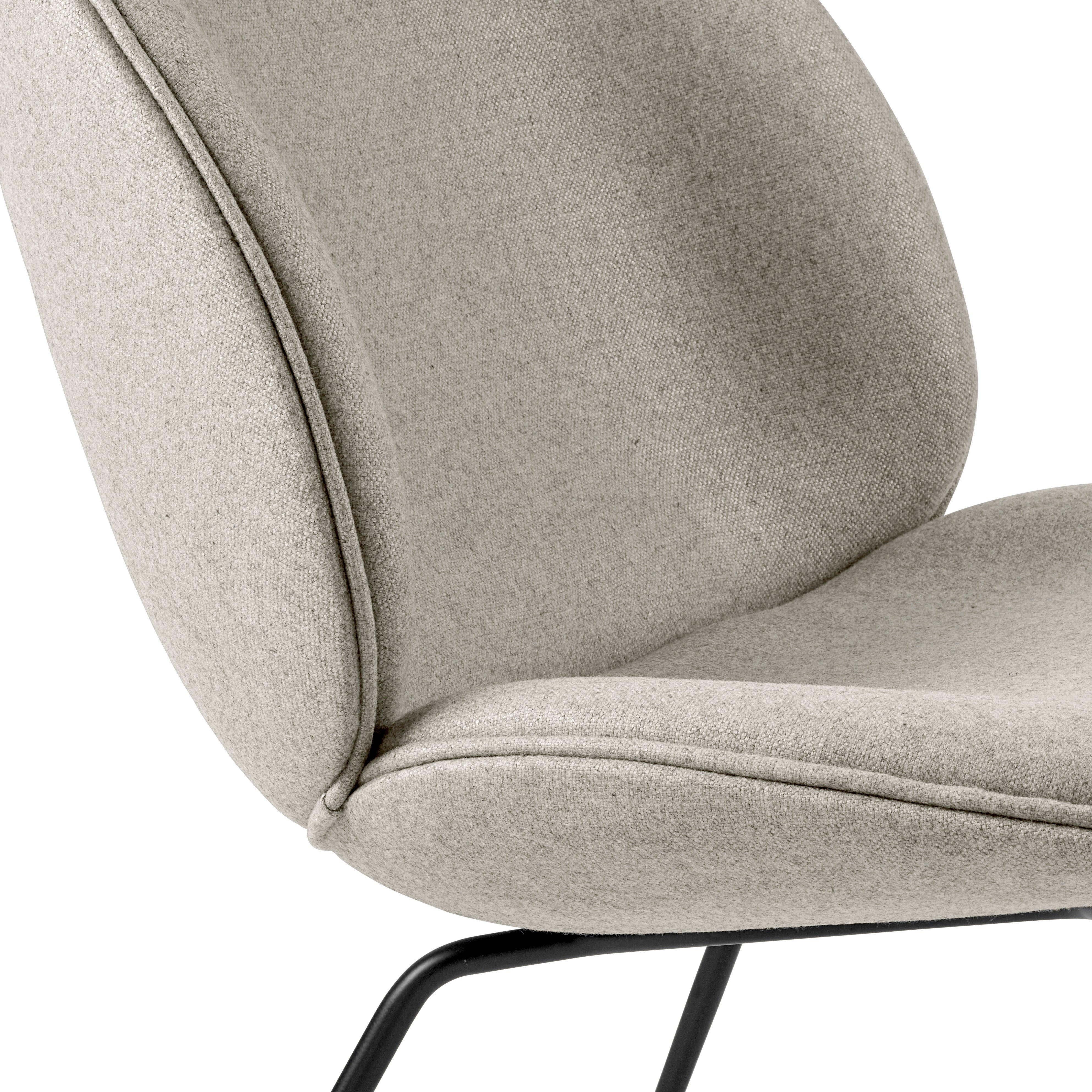 BEETLE upholstered armchair with black base