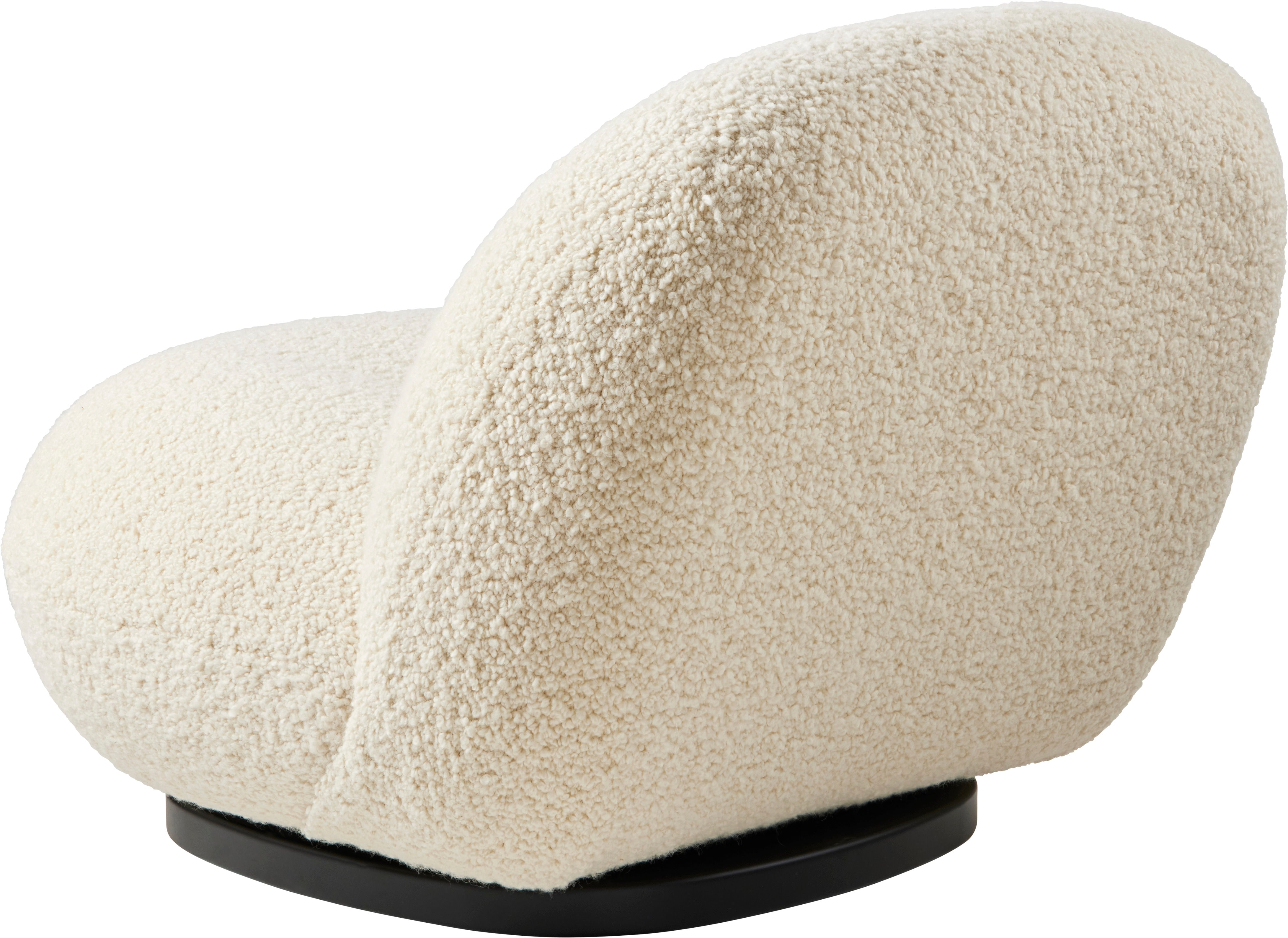 PACHA upholstered armchair with a black base