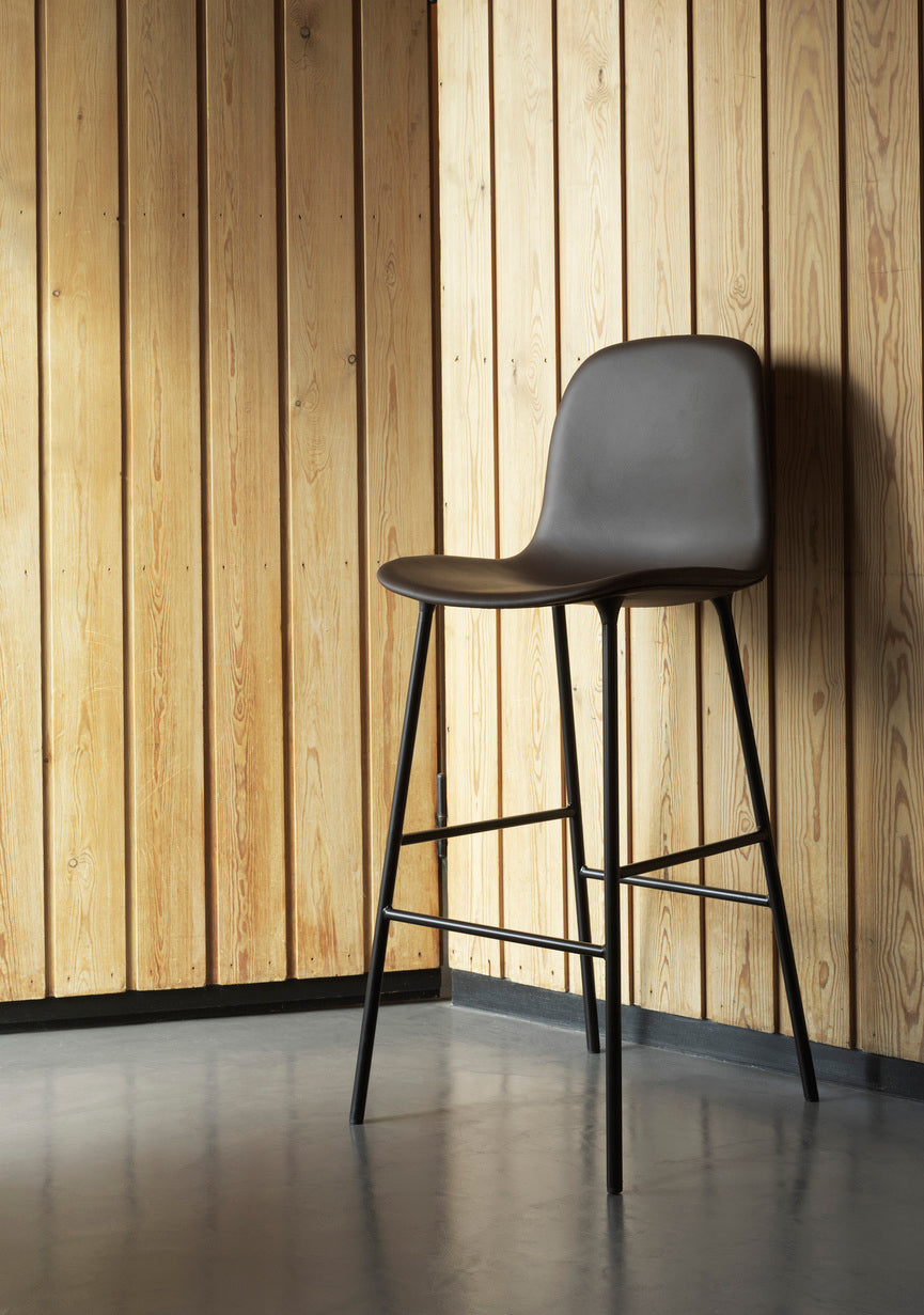 Bar chair upholstered forms with a cream base