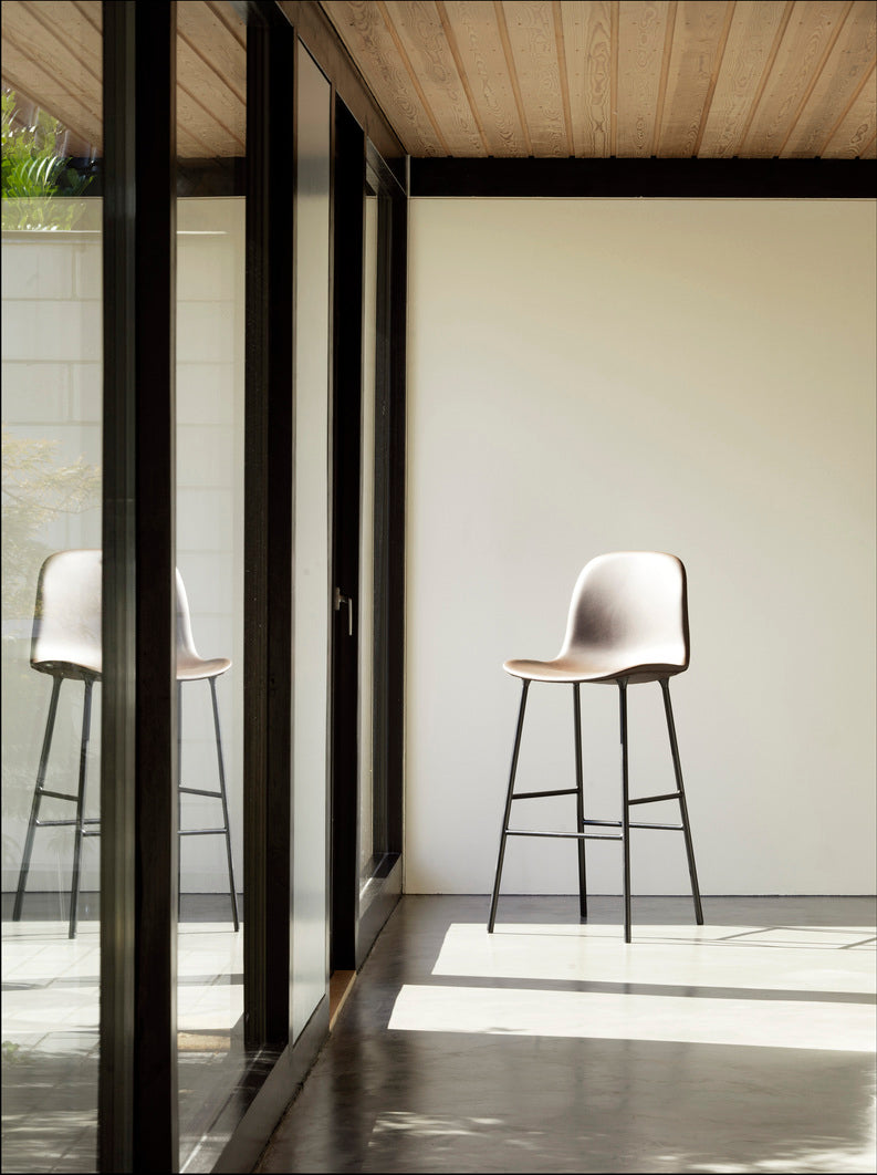 Bar chair upholstered forms with a cream base