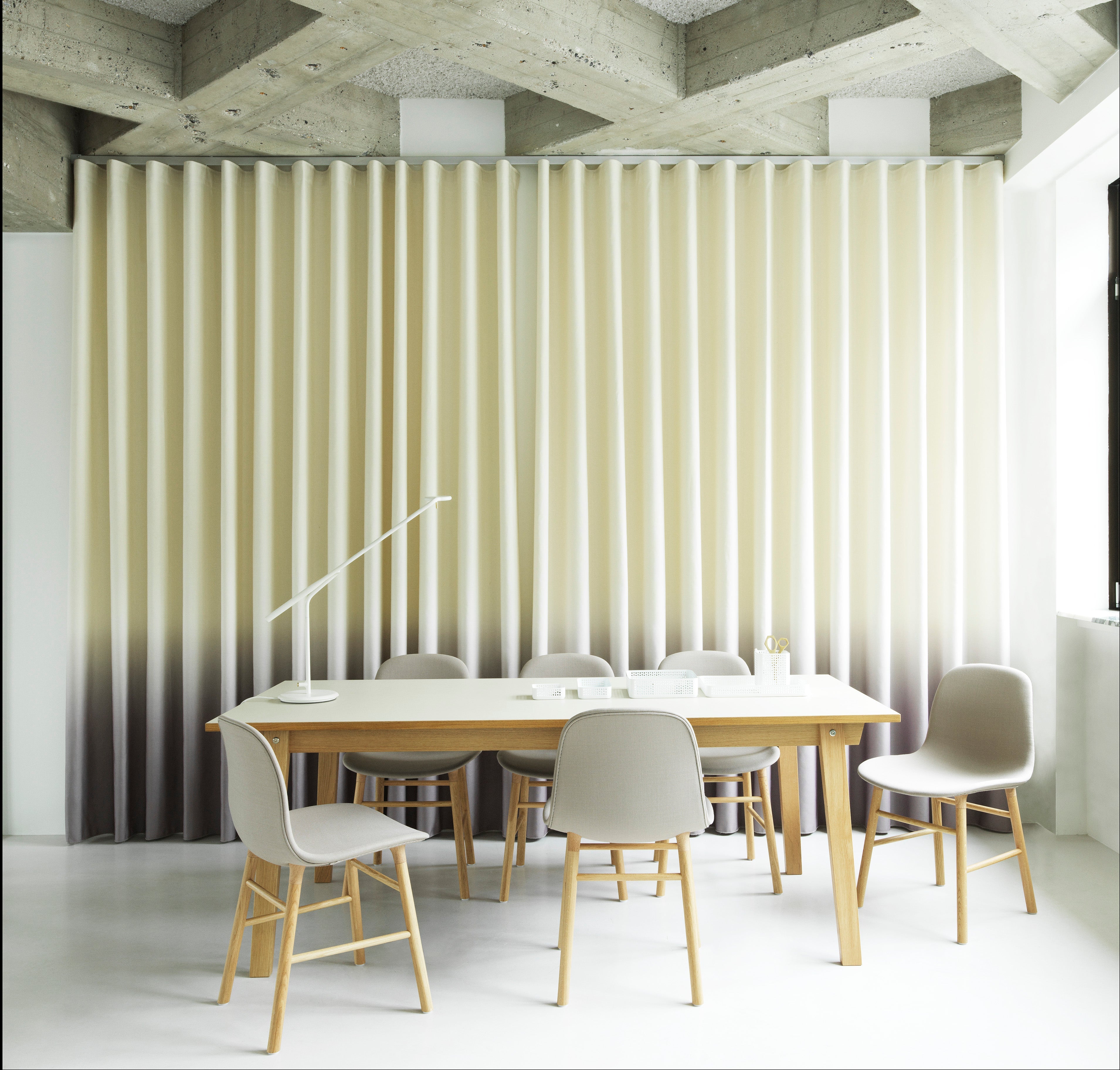 Upholstered chair forms with a nutty base