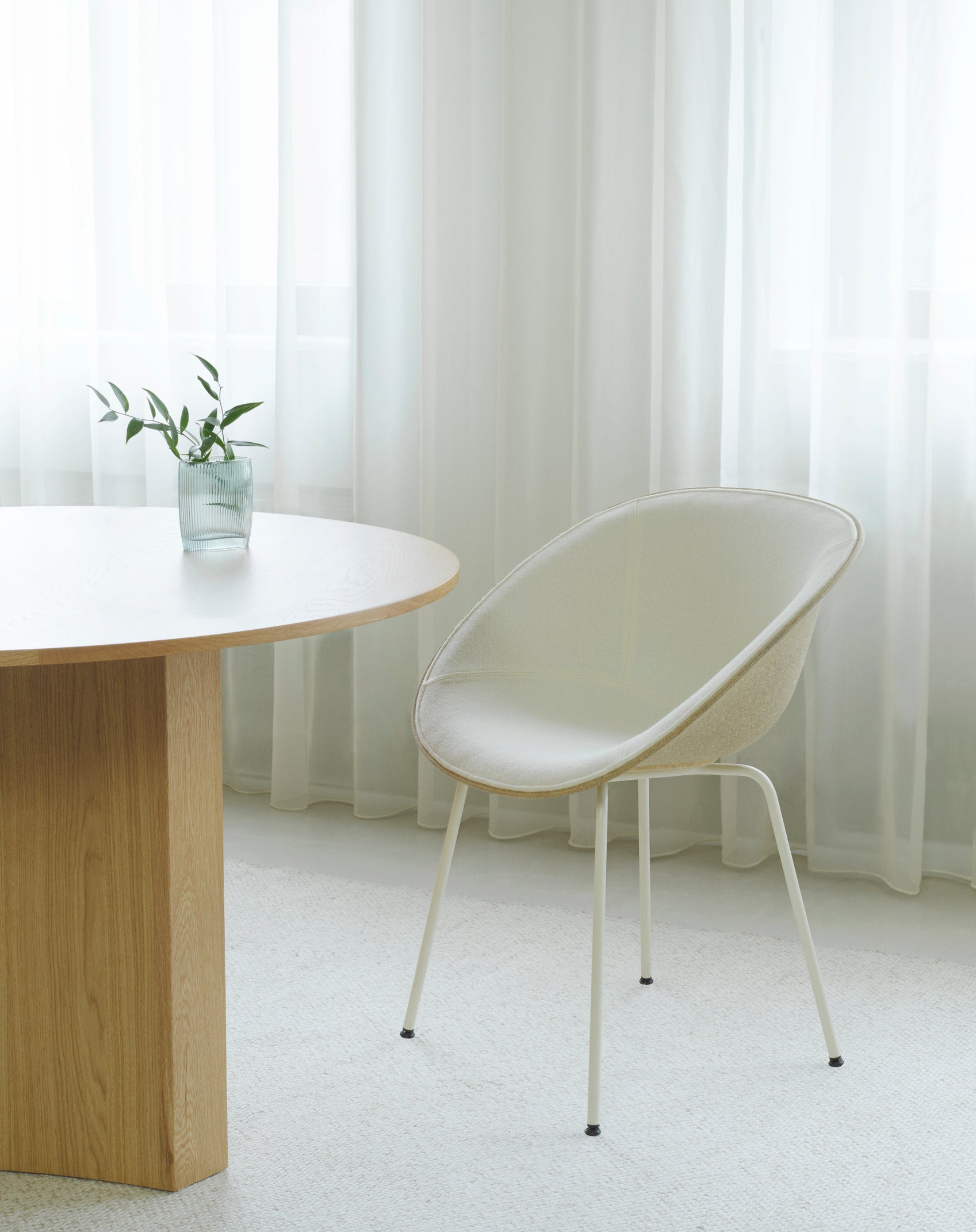 Upholstered chair beige mat with a black base