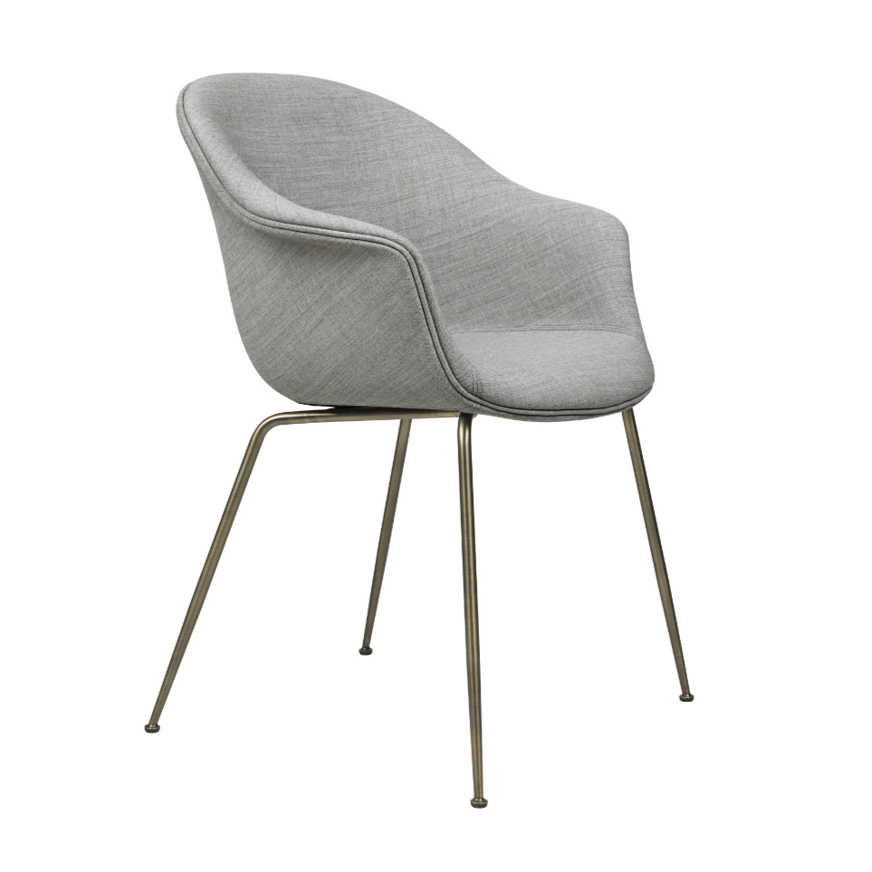 Upholstered BAT chair with a brass base
