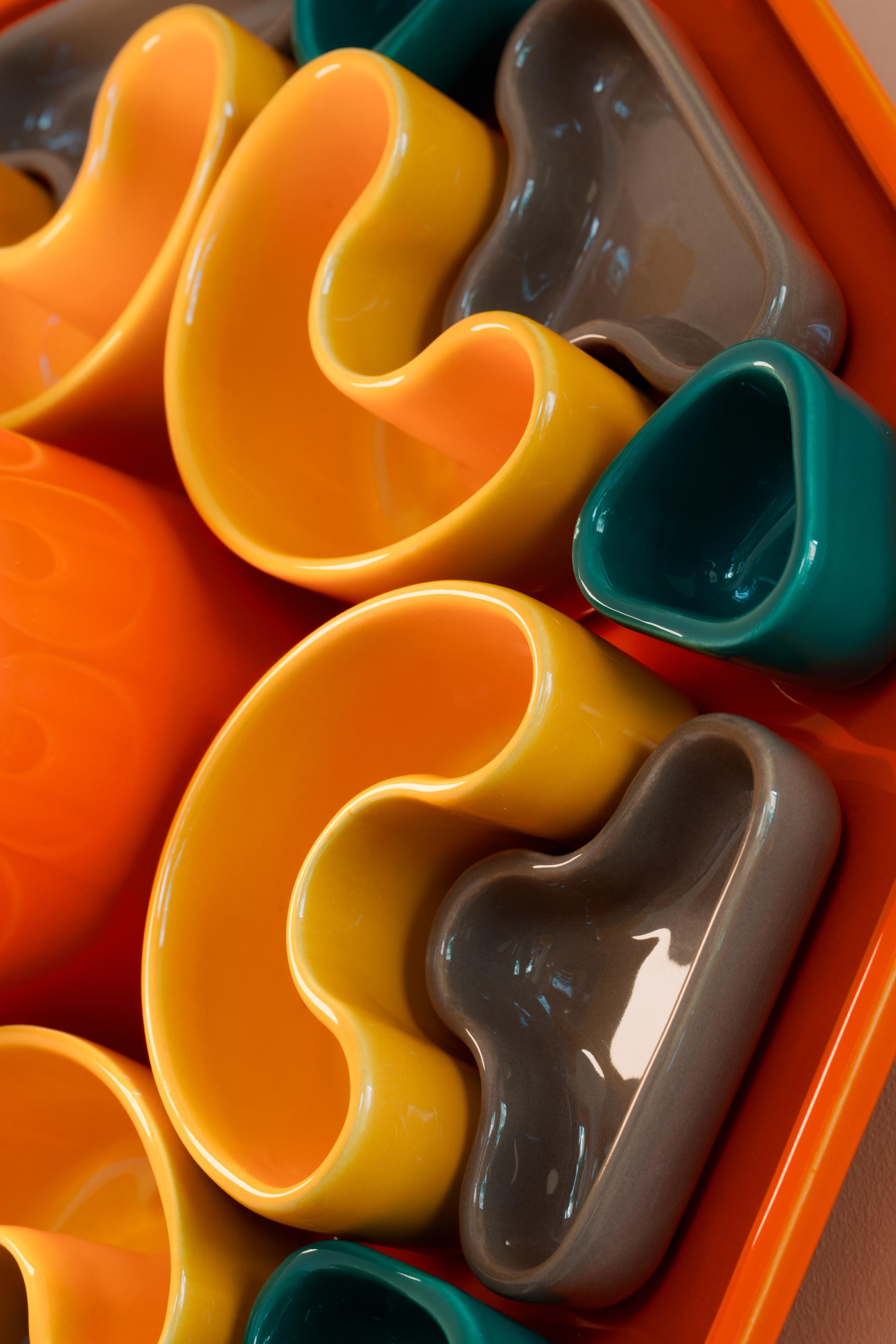 Ceramic wall lamp PHYTIA in orange with yellow, brown, and green
