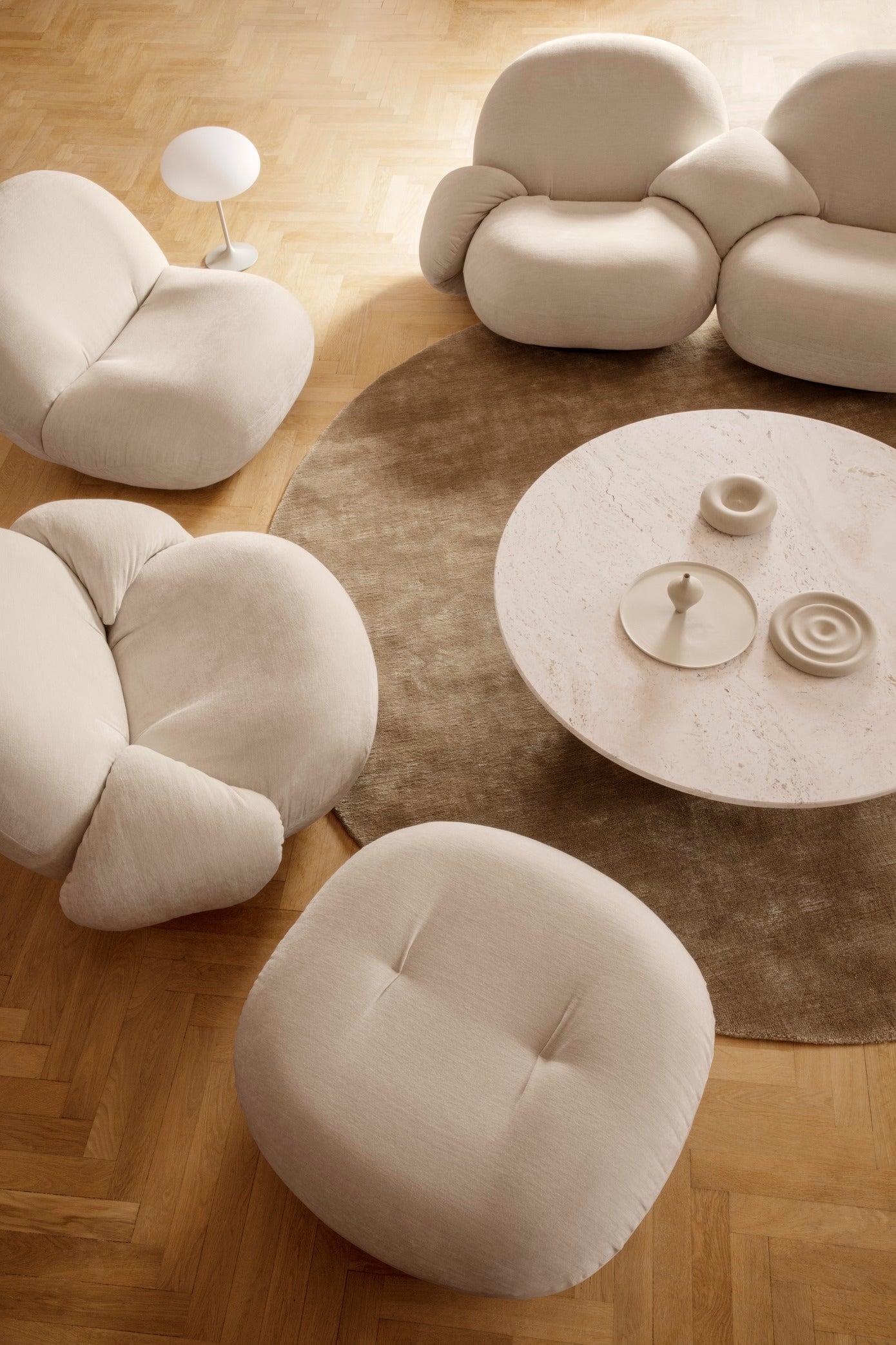 PACHA armchair upholstered with a gold base