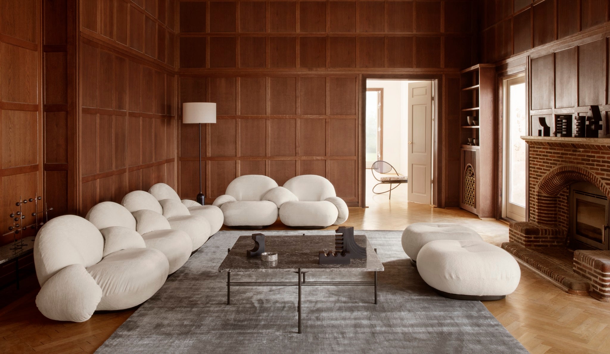 COPACABANA upholstered armchair with a black base