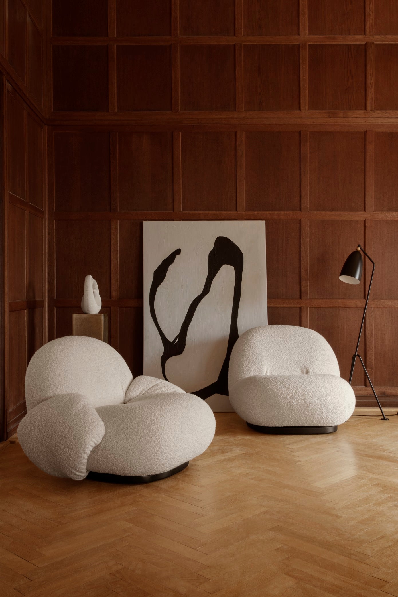 PACHA armchair upholstered with a gold base
