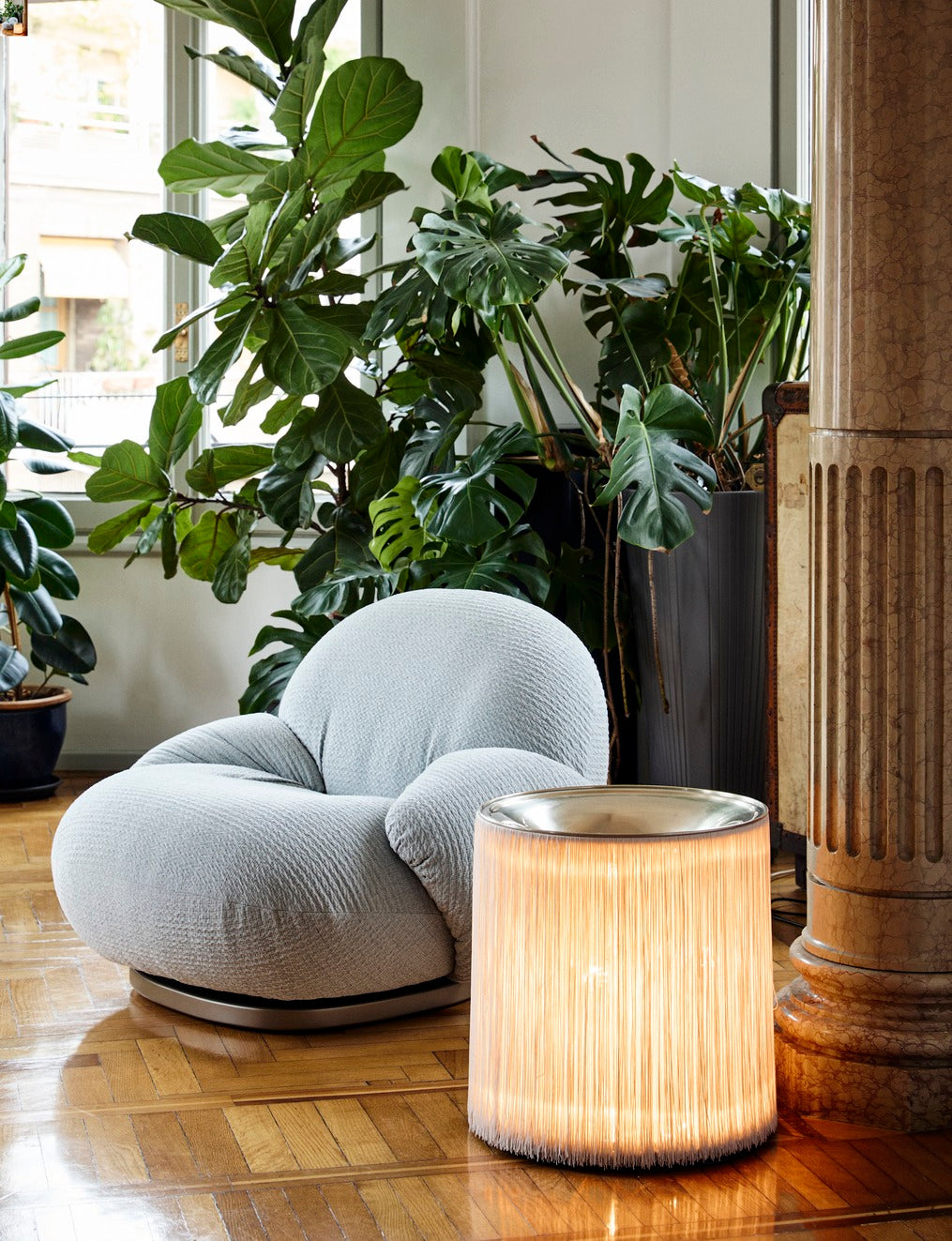 PACHA armchair upholstered with a gold base