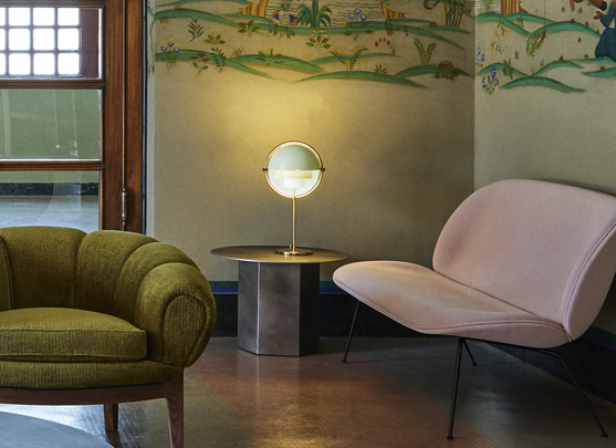 MULTI-LITE table lamp with a chrome base and white shade