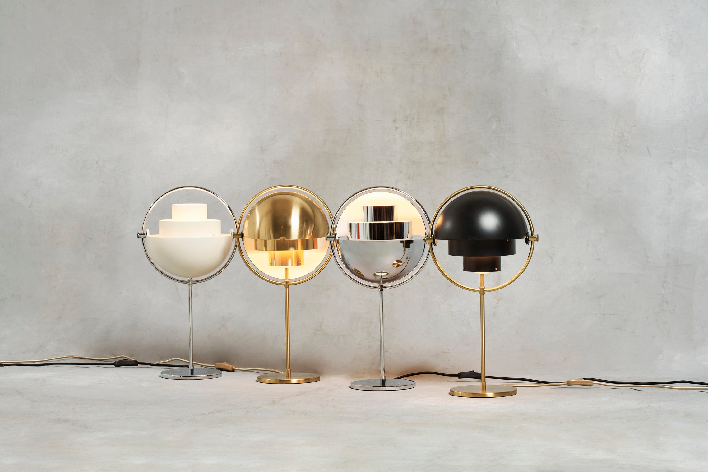 MULTI-LITE table lamp with a chrome base and white shade