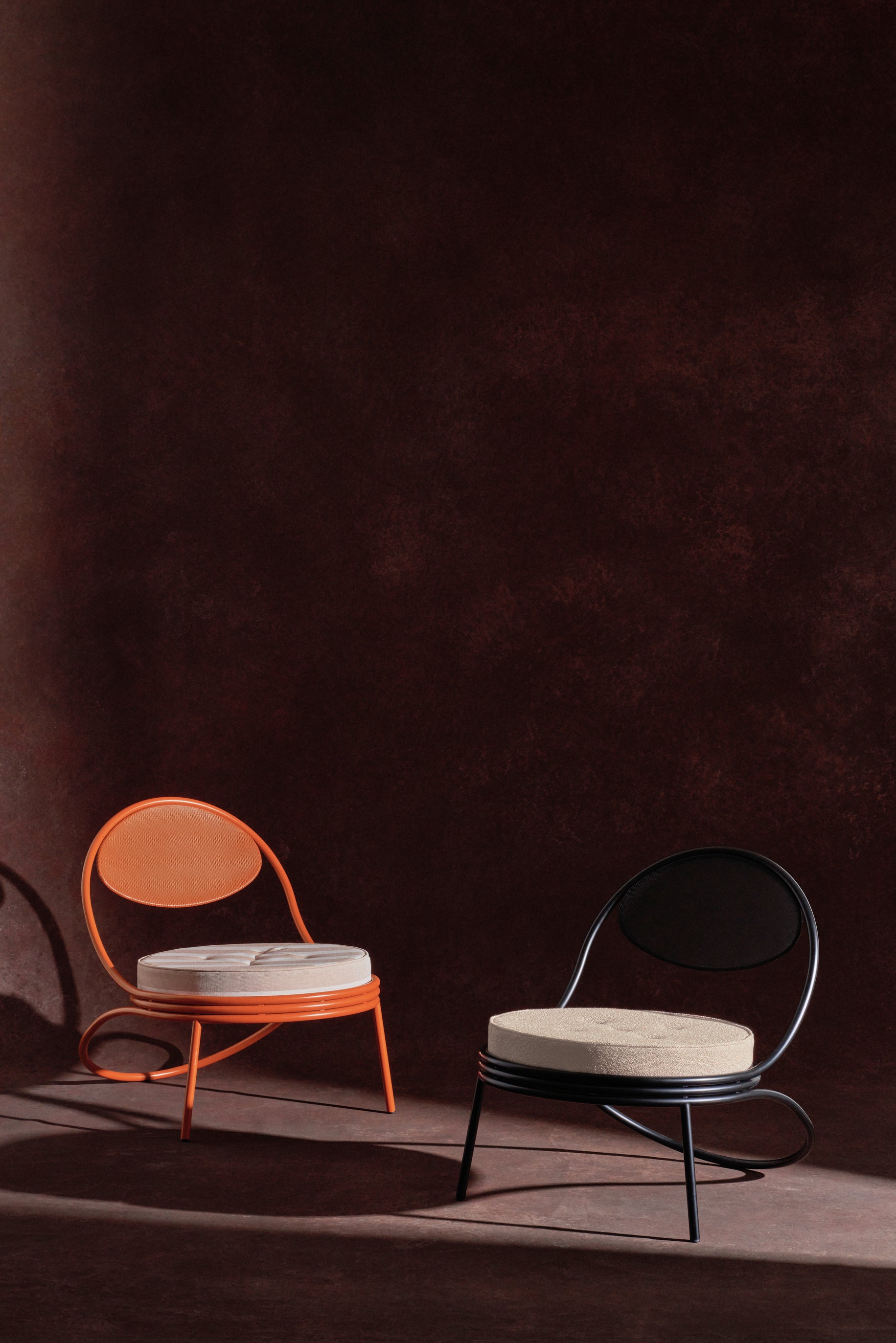 COPACABANA upholstered armchair with a black base