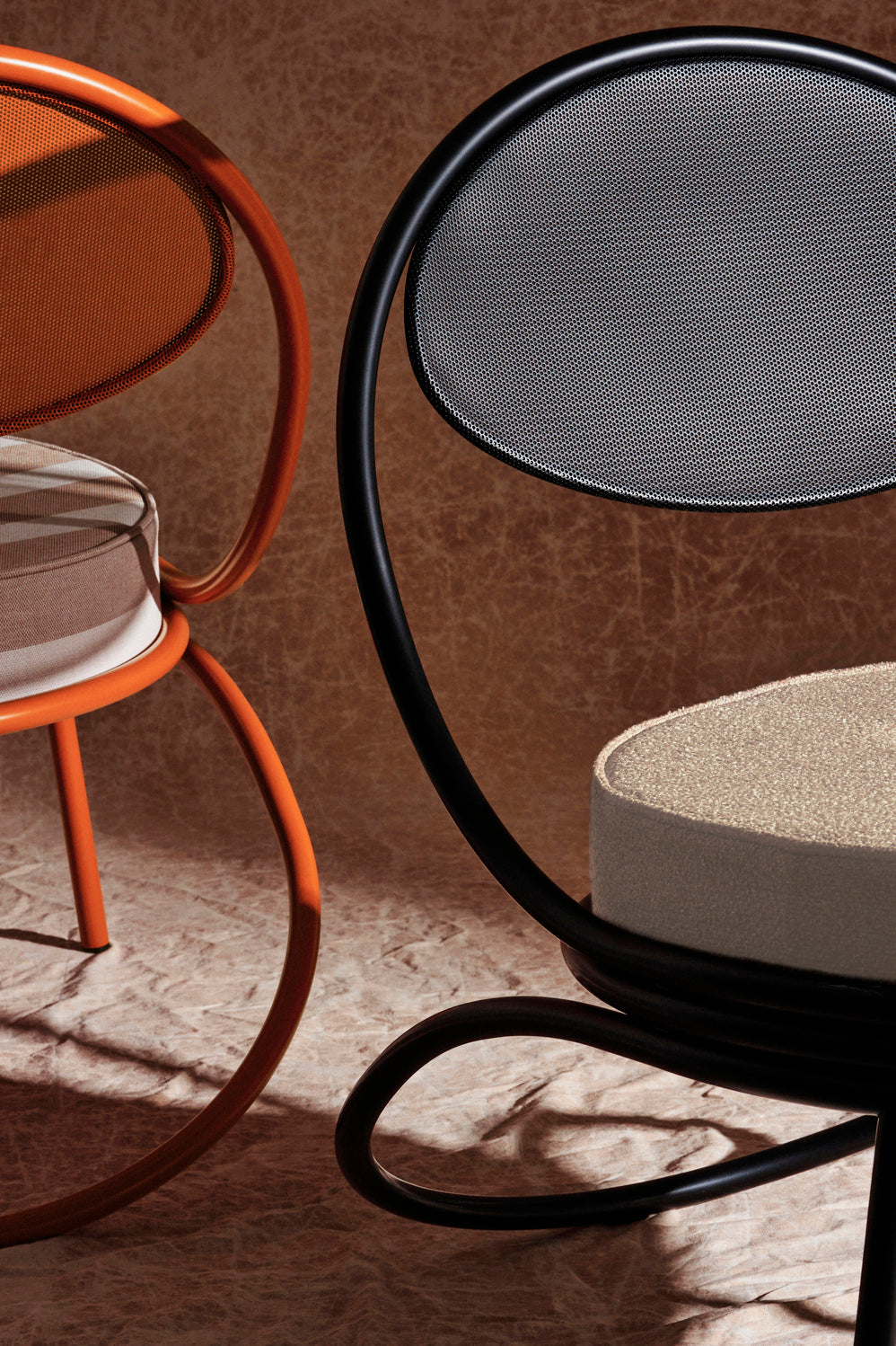 COPACABANA upholstered armchair with a black base