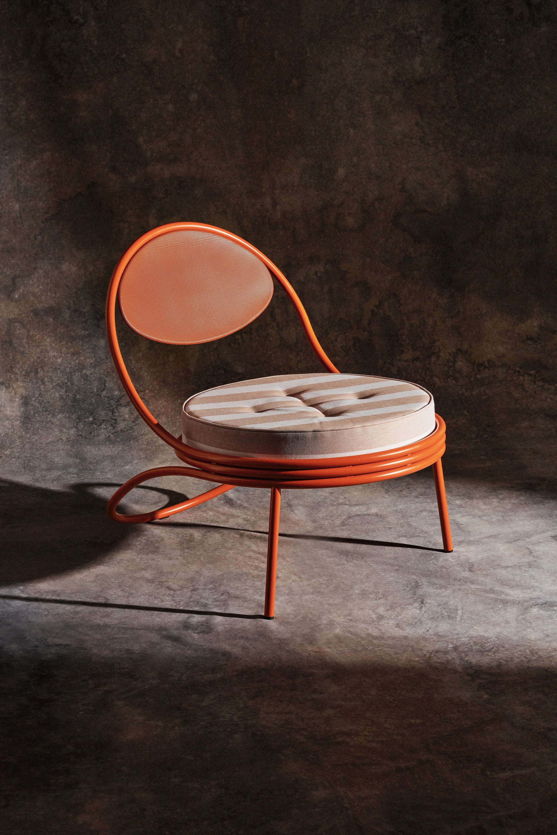COPACABANA upholstered armchair with a black base