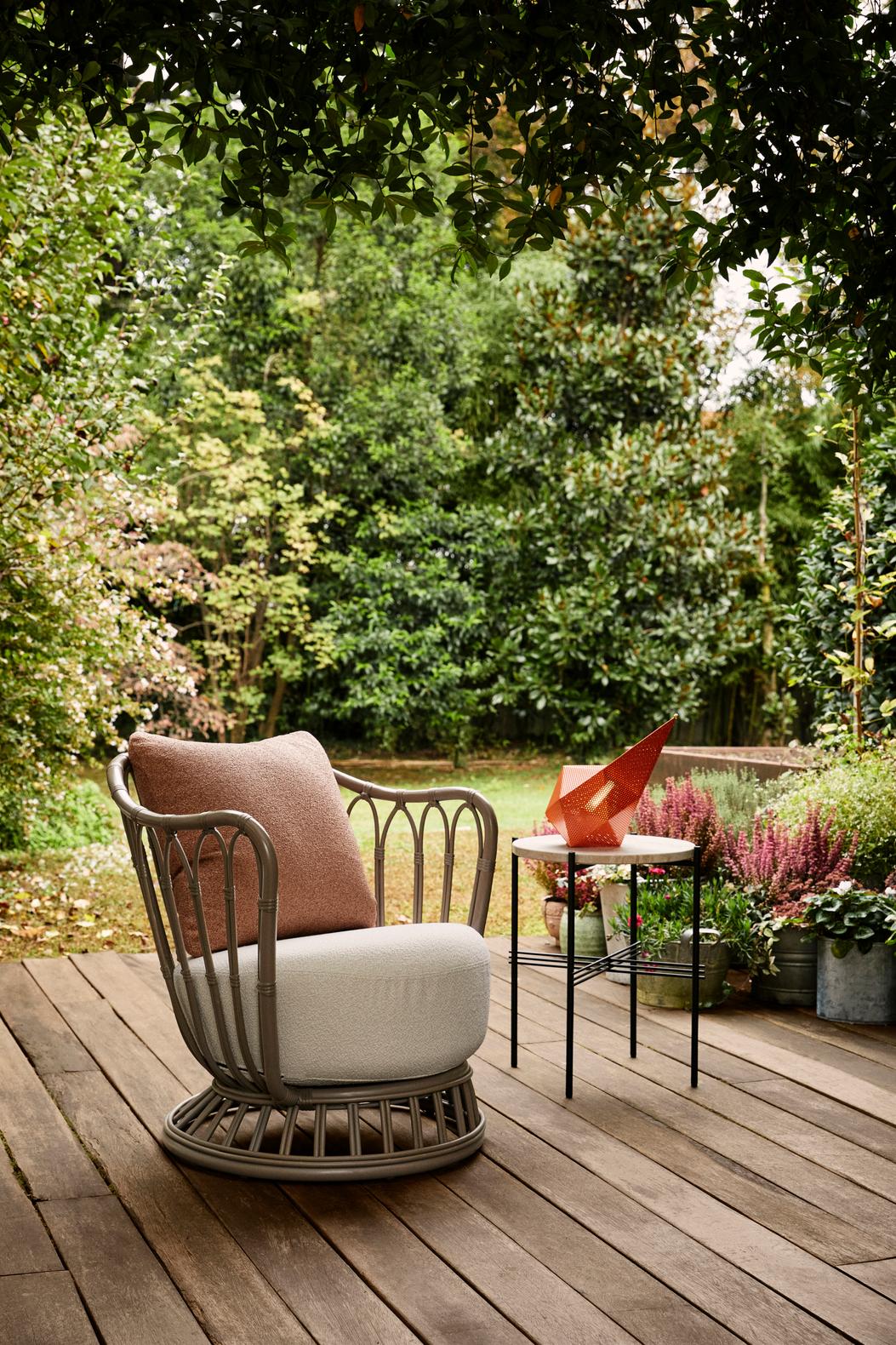 GRACE upholstered garden armchair with a black base