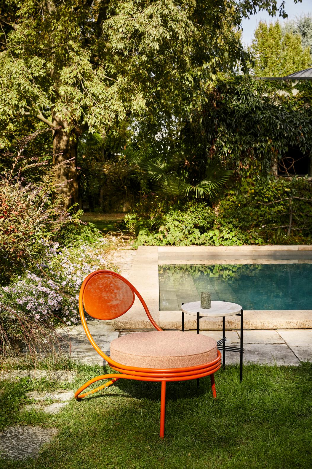 COPACABANA upholstered armchair with a black base