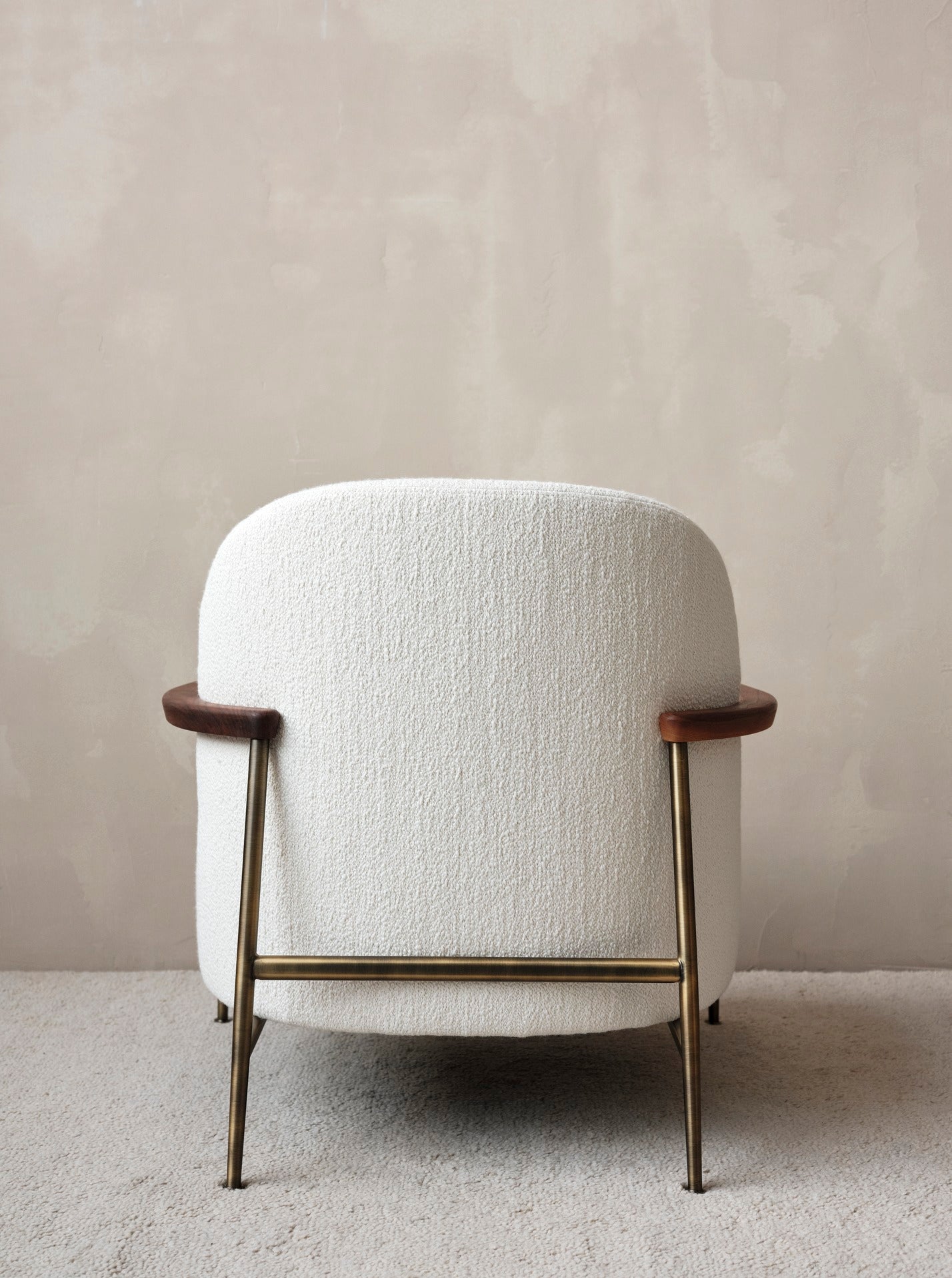 SEJOUR upholstered armchair with black base