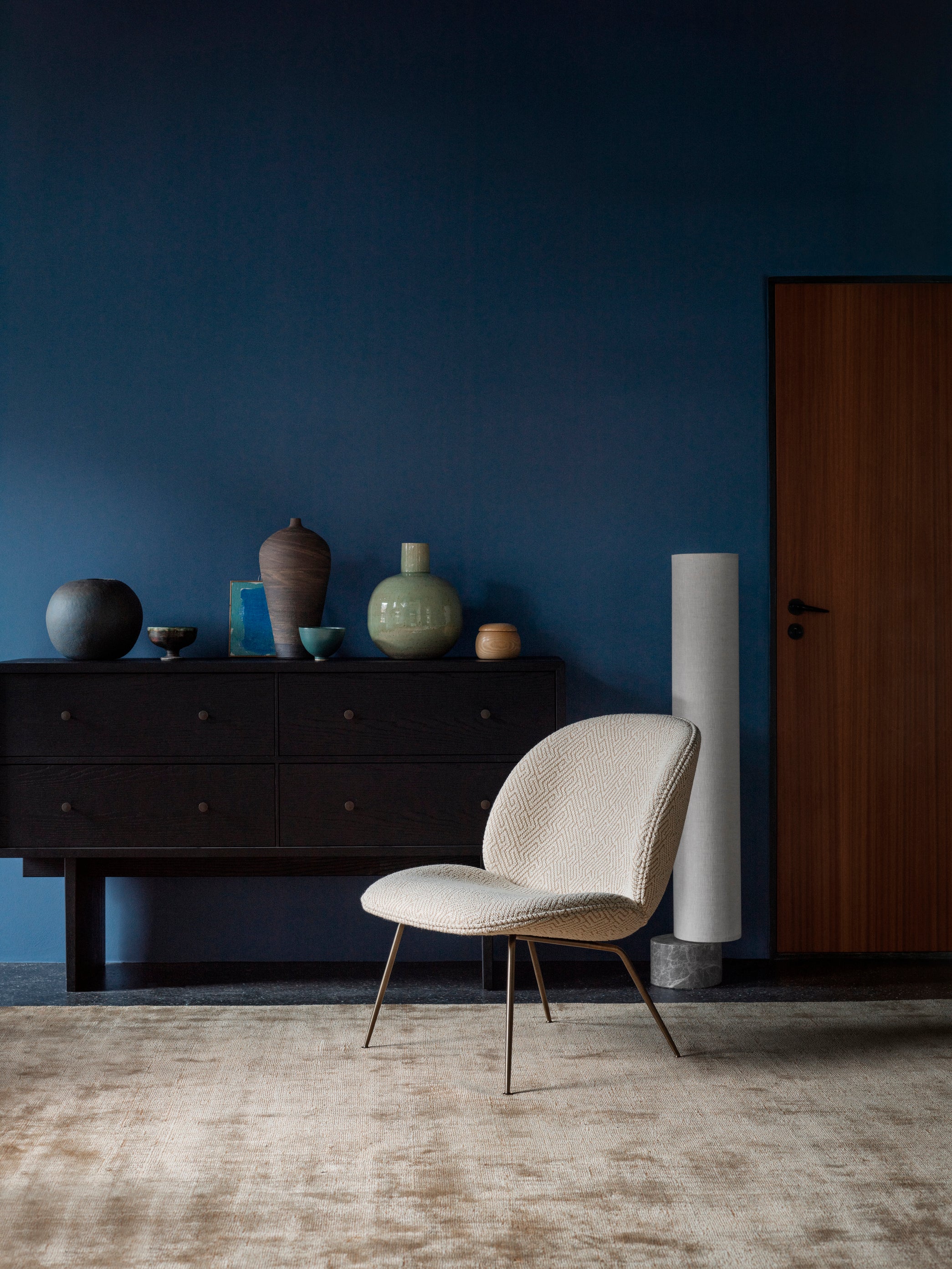 BEETLE upholstered armchair with black base