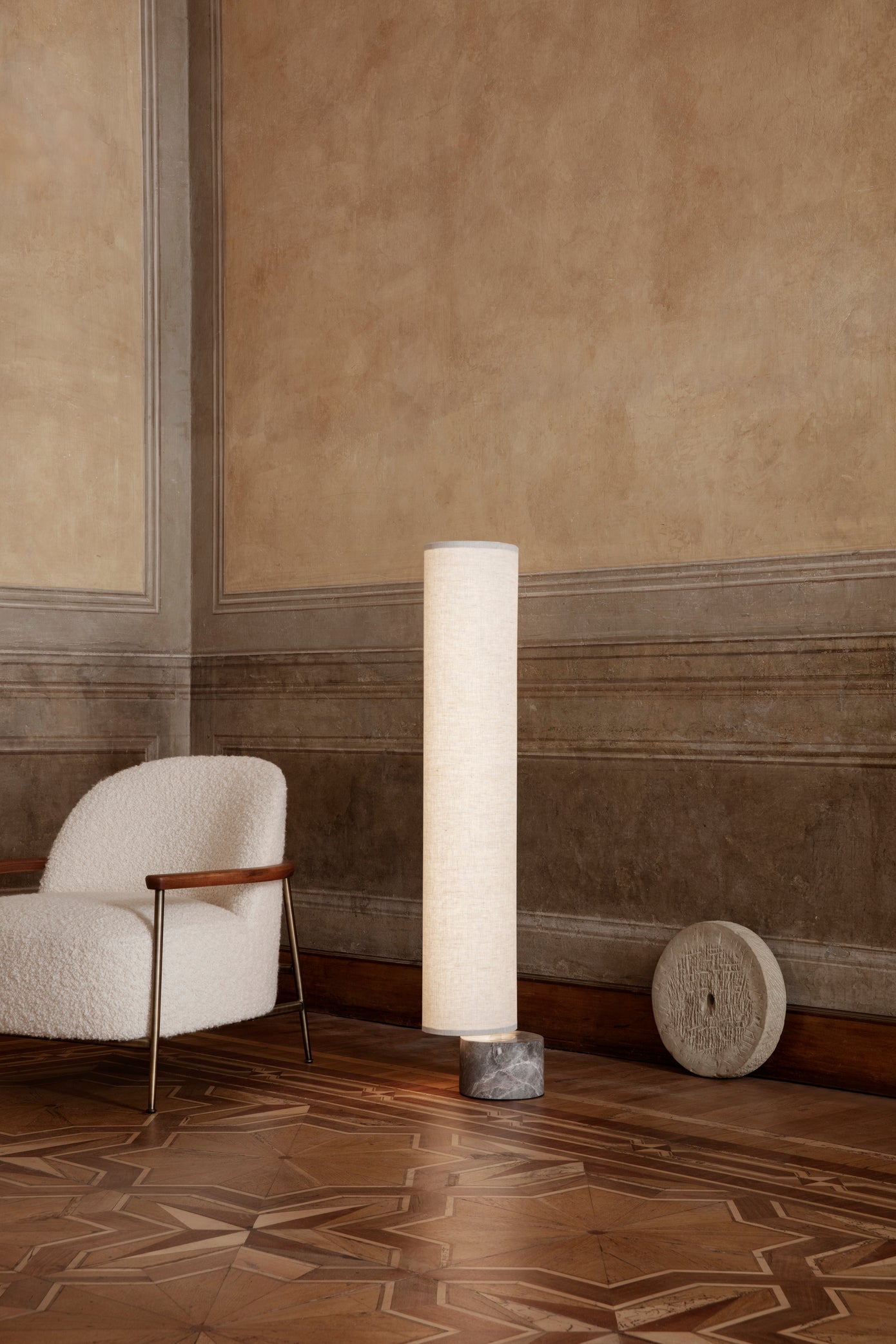 SEJOUR upholstered armchair with black base