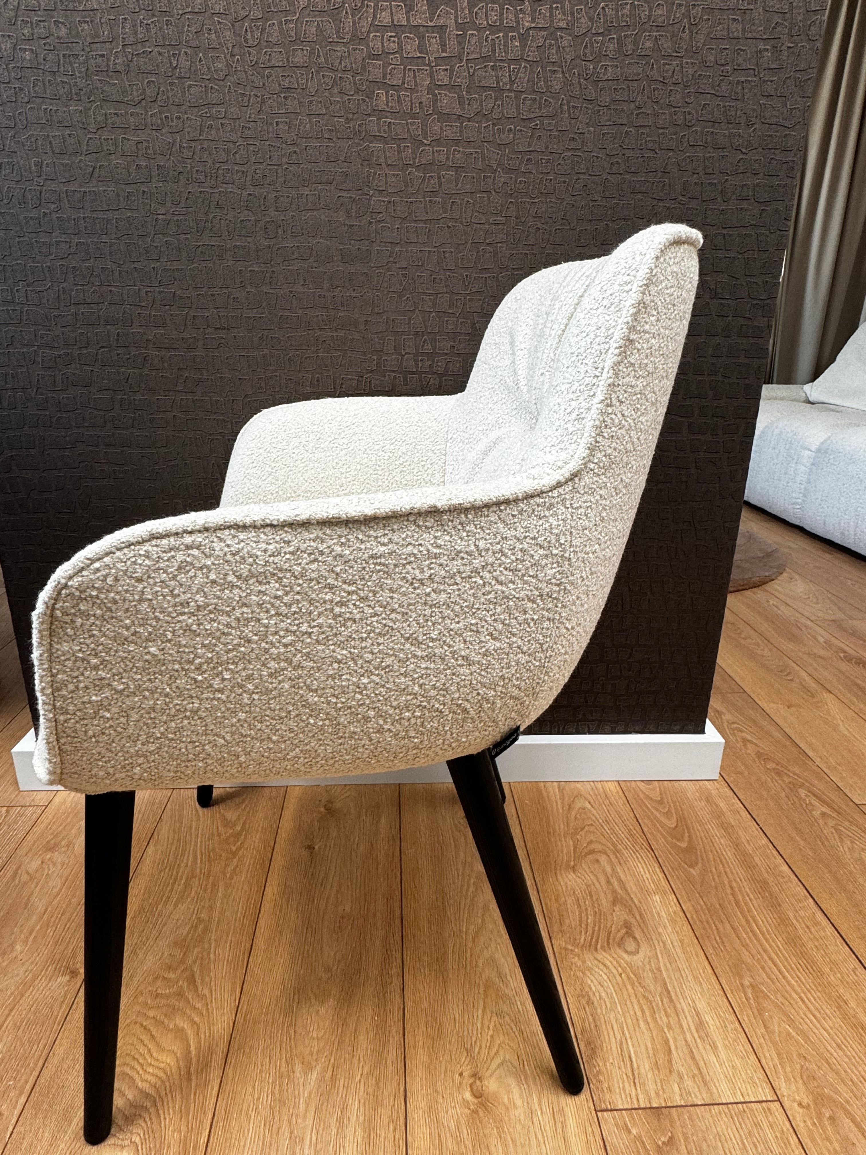 COCOON chair in cream with a black base - Display model