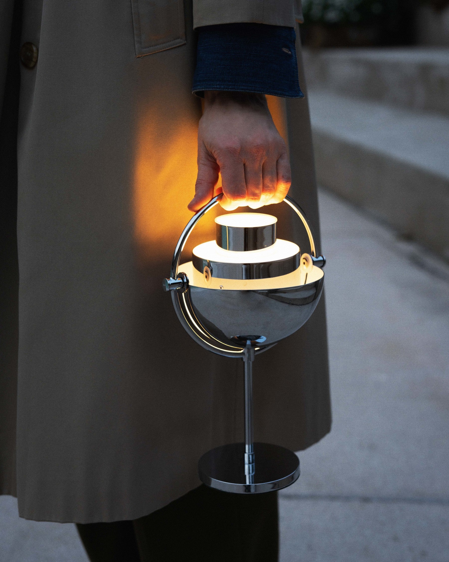 MULTI-LITE portable lamp in white with a chrome base