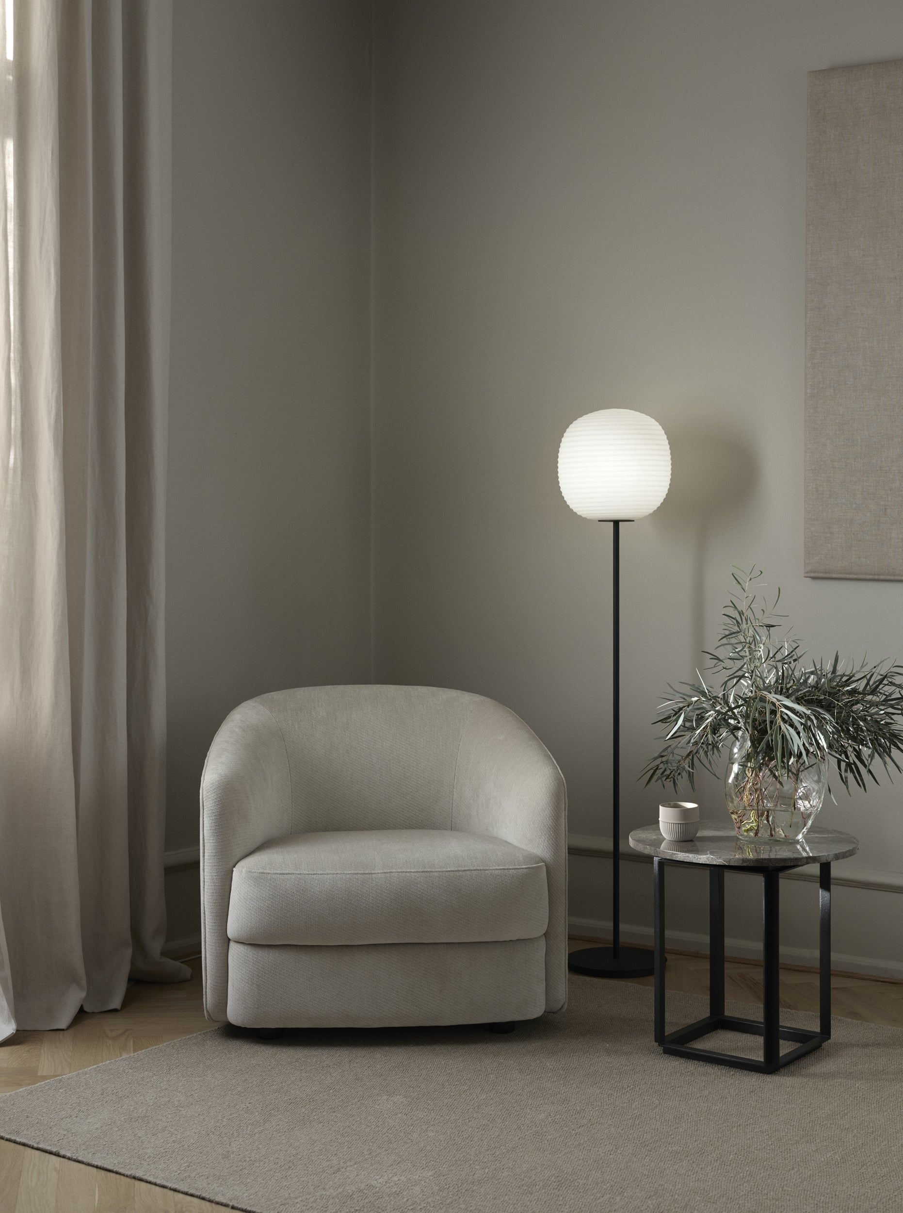 Lantern white floor lamp with a black base