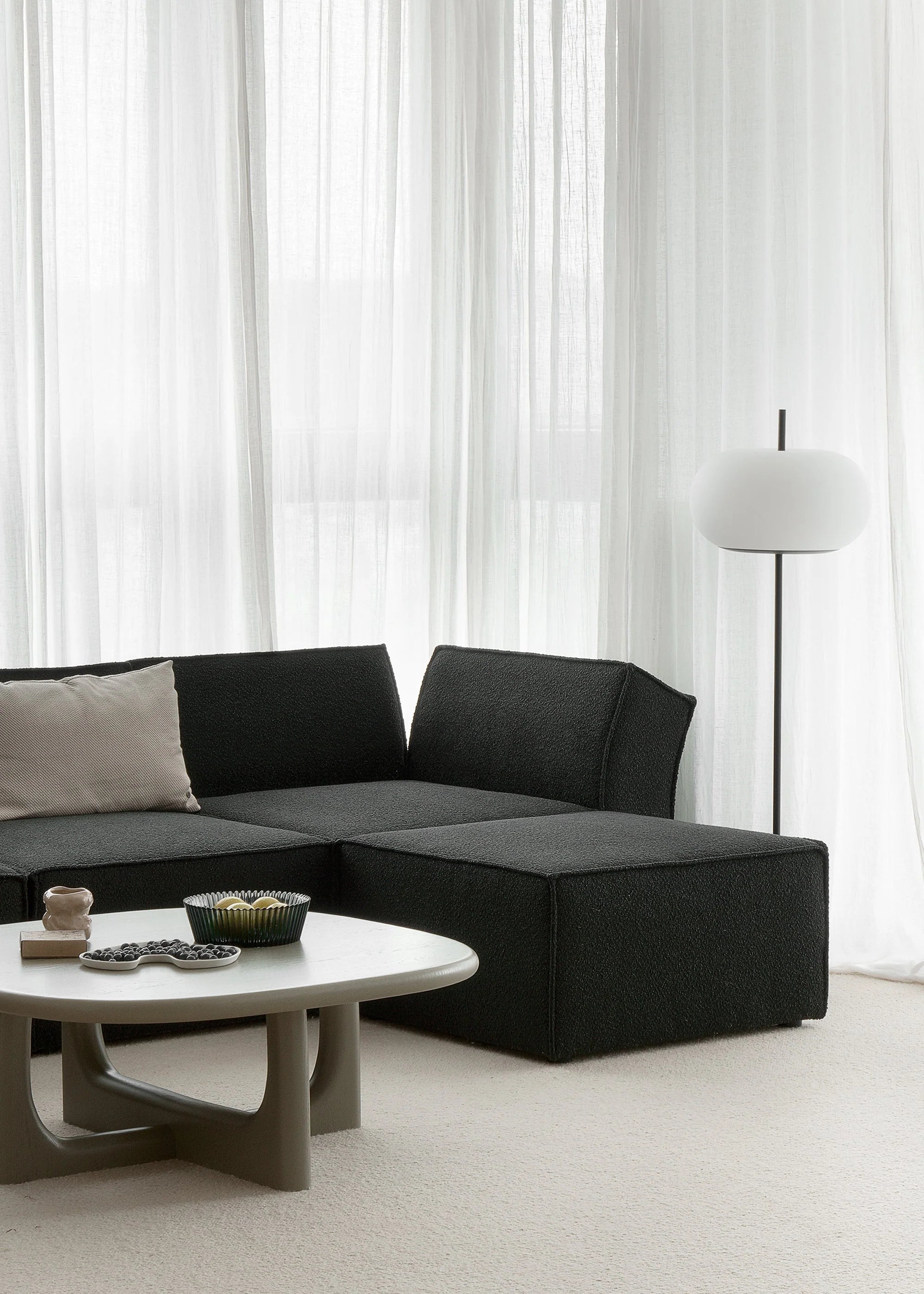 Modulsofa ANDO - linkes Element in hellgrauem Boucle
