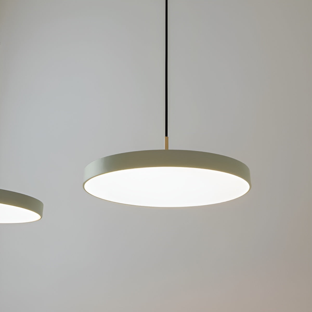 ASTERIA PLUS pendant lamp in olive with a gold accent