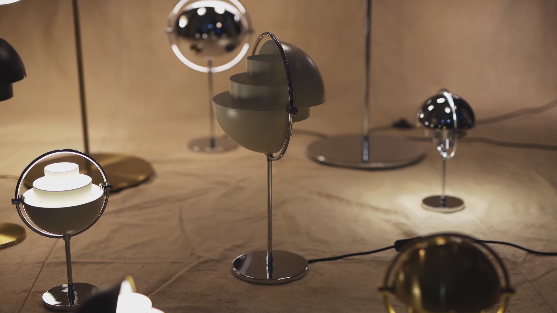 MULTI-LITE table lamp in light green with a brass base