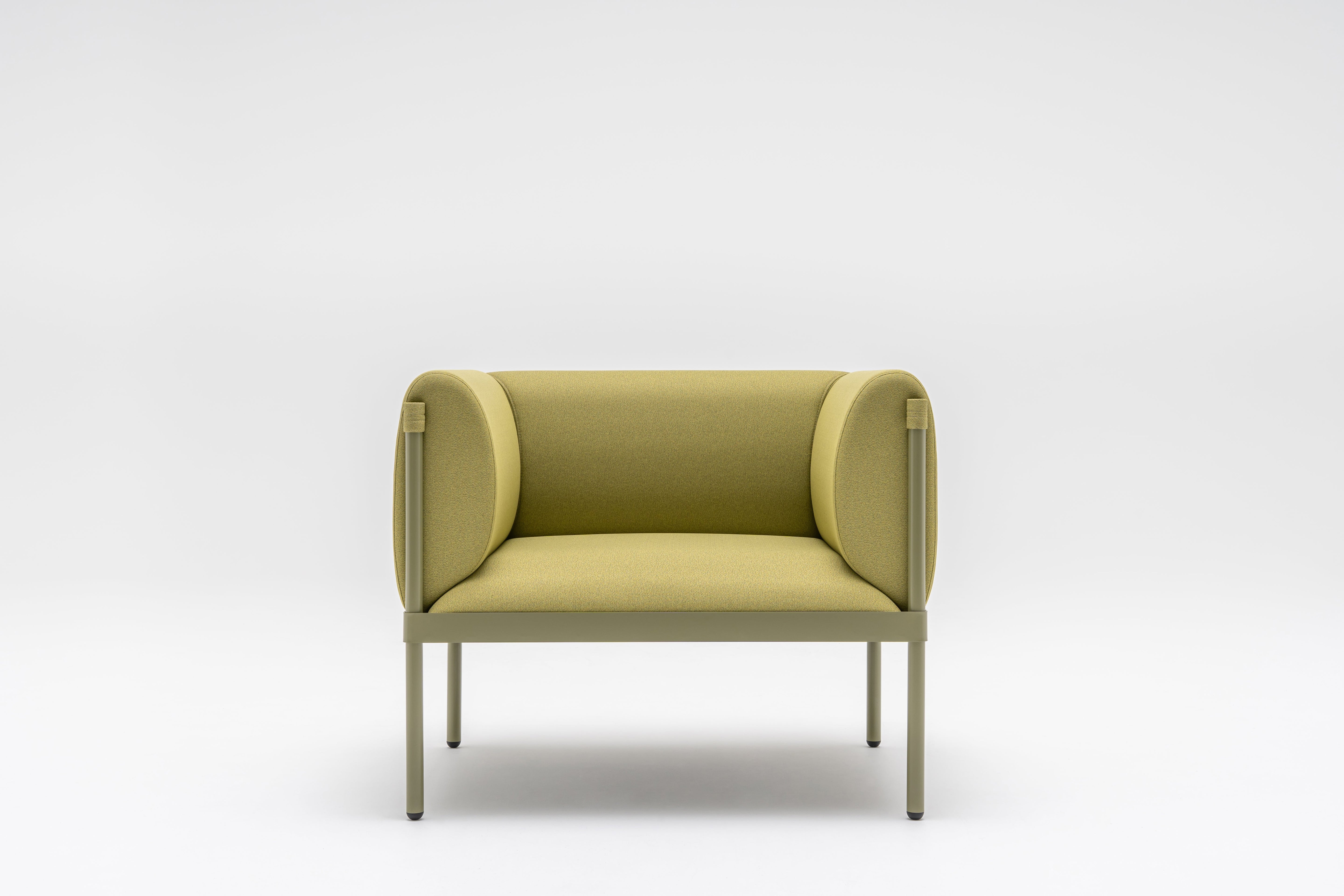 Low upholstered stilt armchair