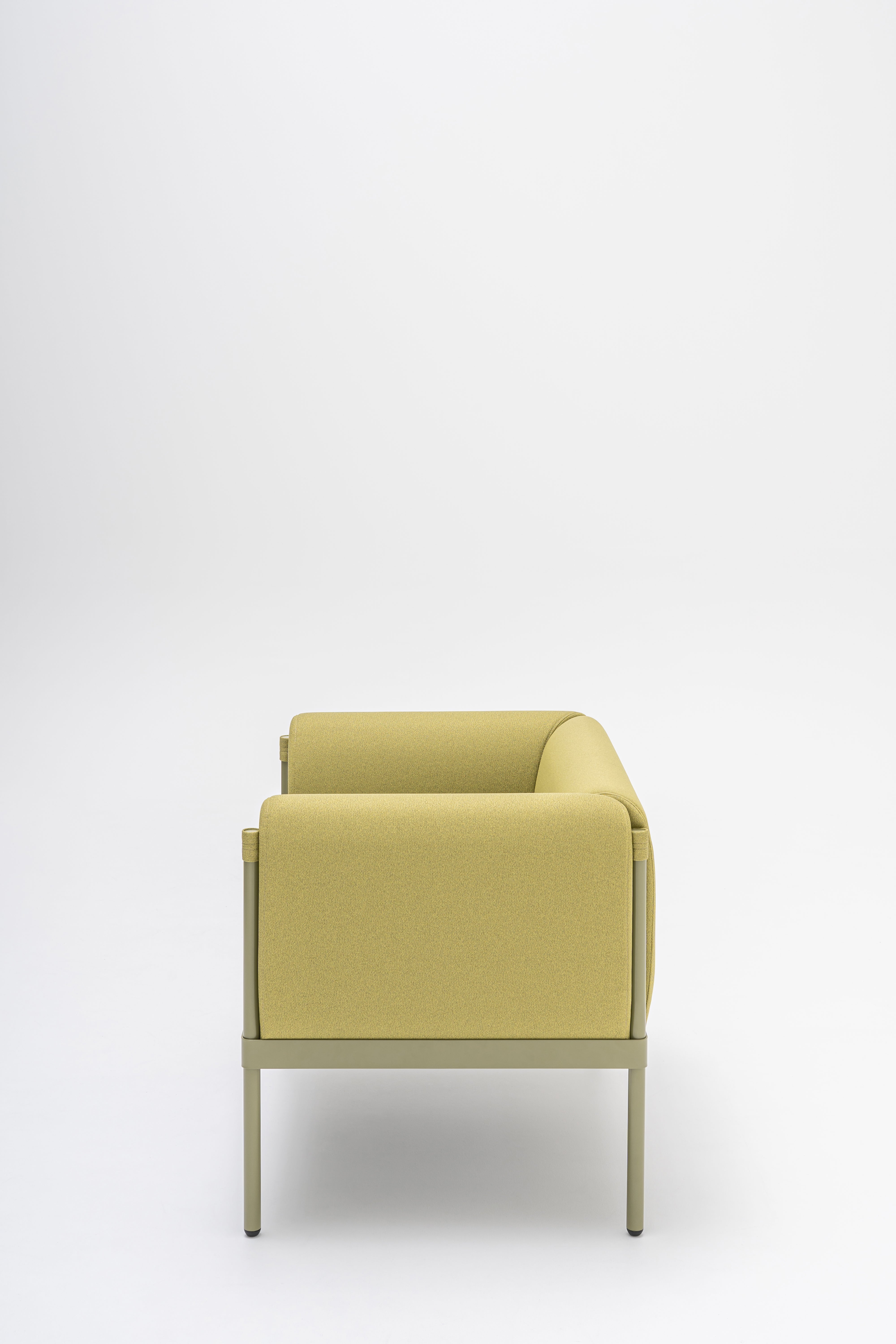 Low upholstered stilt armchair