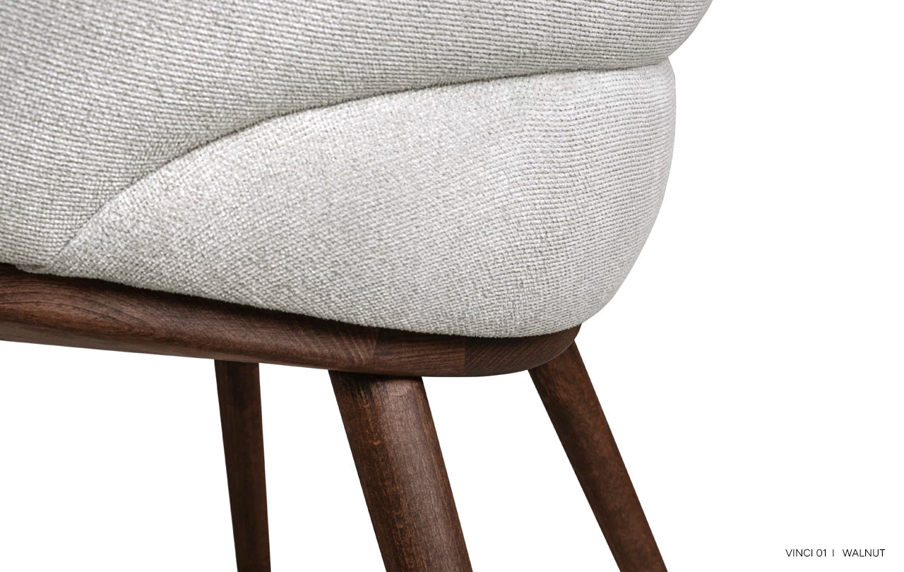 AMA upholstered chair with a wooden base