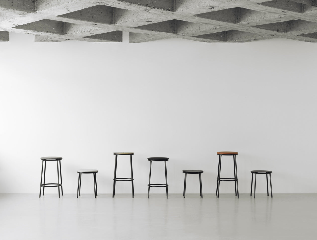 Circa beige stool with a black base