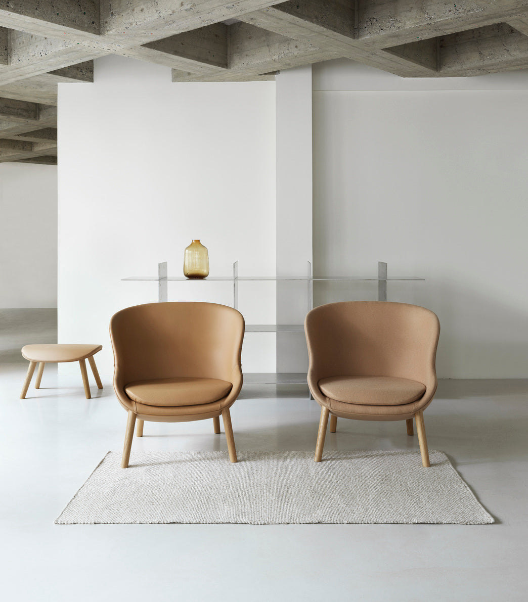 Hyg Upholstered footrest with an oak base