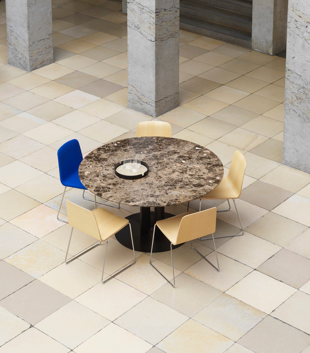 Round table Scala sand marble top with a black base
