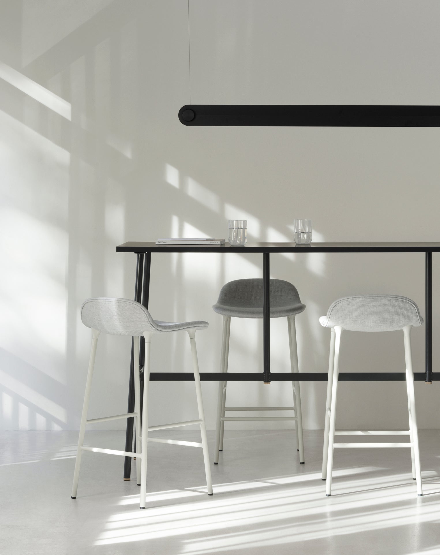Upholstered HAKER forms with a black base