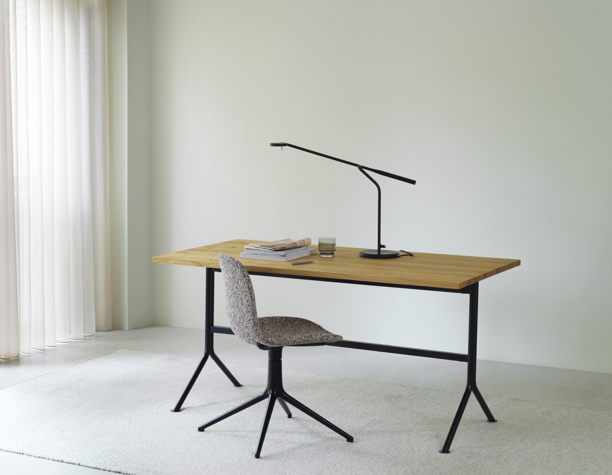 Dark brown Kip desk with a gray base