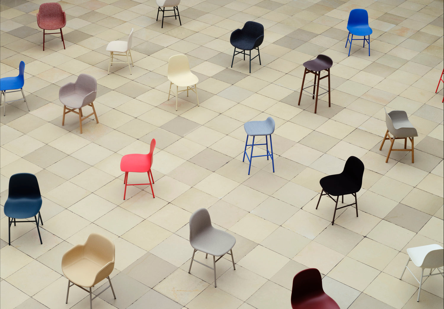 A chair of green forms with a chrome base