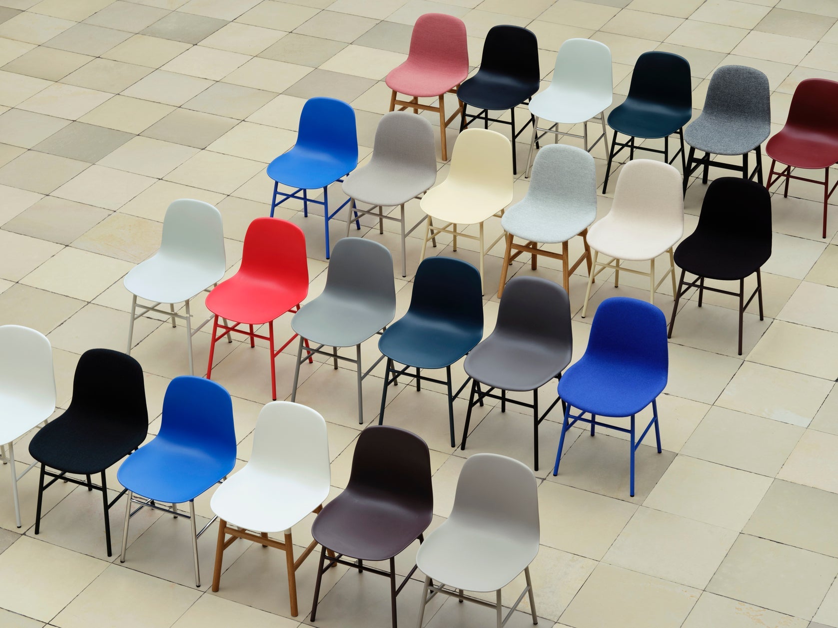 Upholstered chair forms with a chrome base