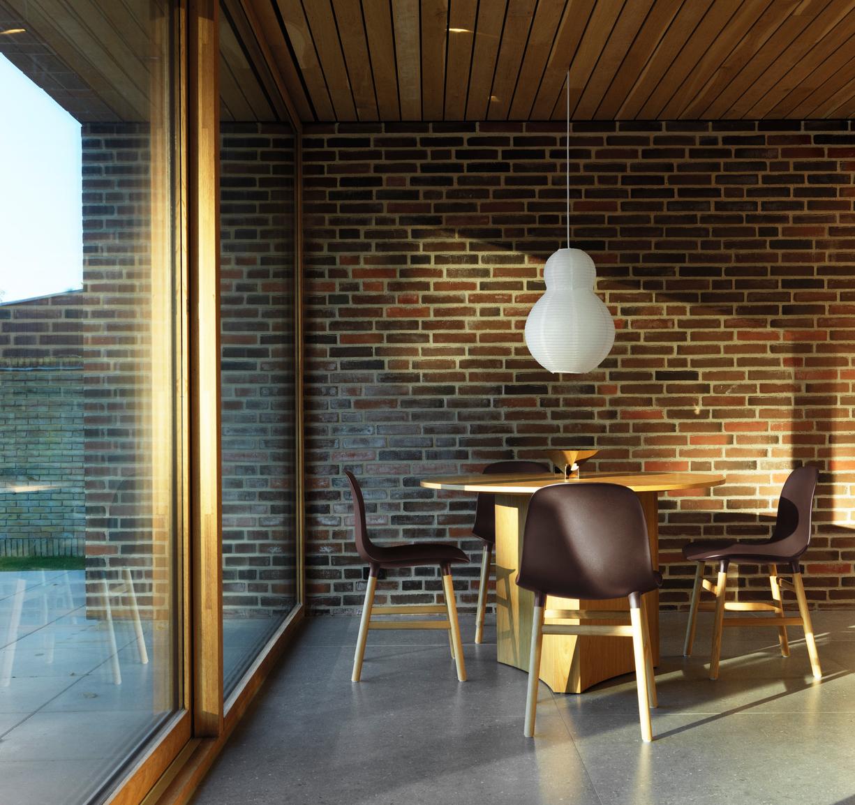 Chair burgundy forms with a black oak base