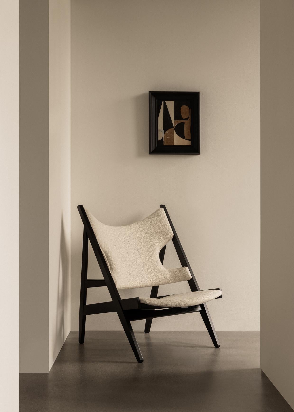 KNITTING cream boucle armchair with black oak base