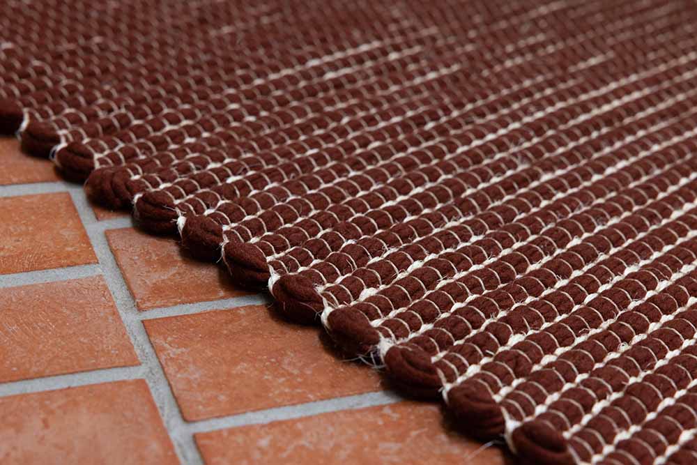 Frame brick rug