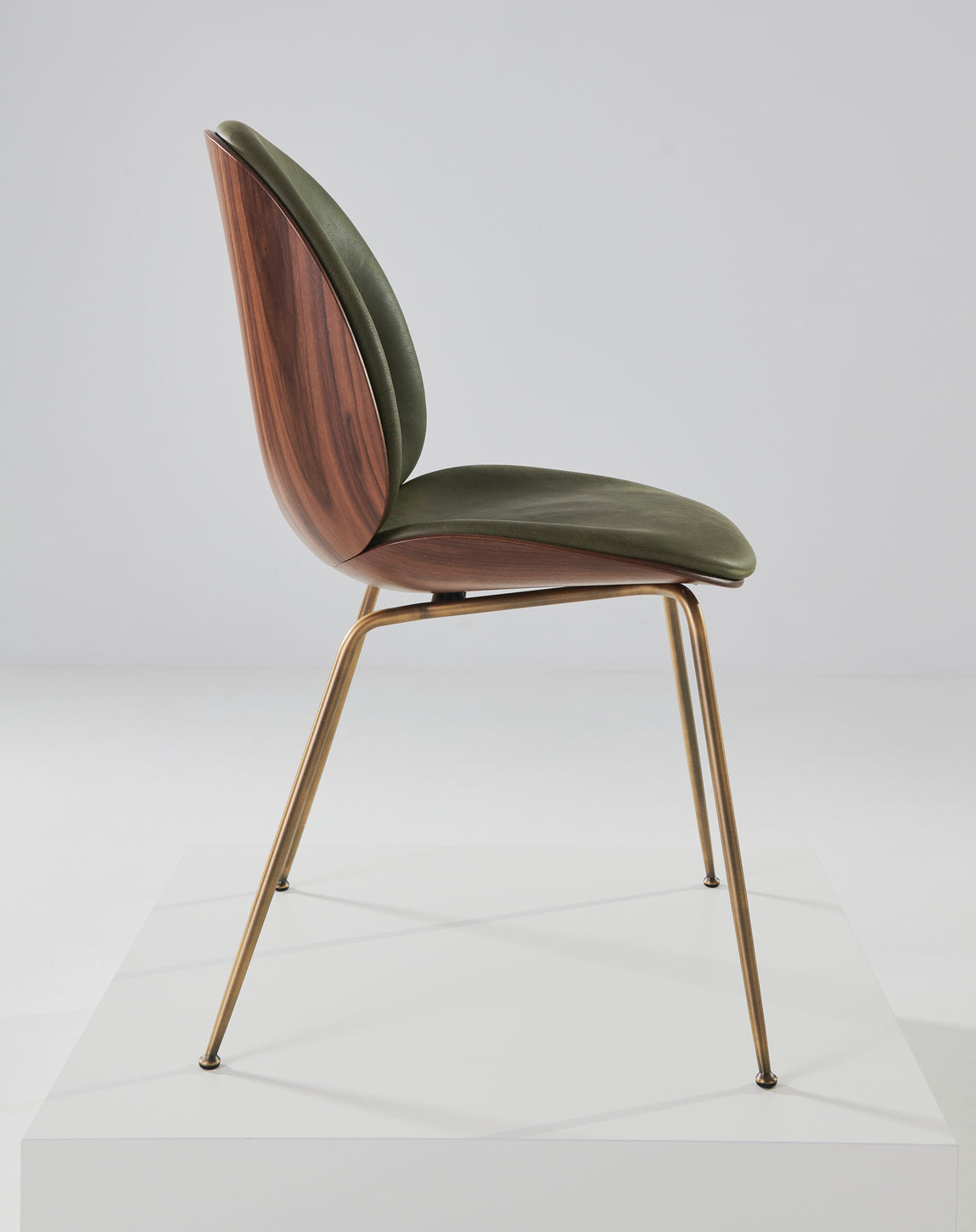 BEETLE upholstered chair with walnut wood and black chrome base