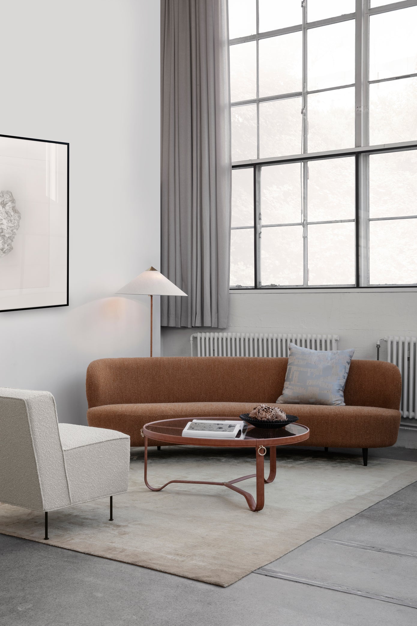 MODERN LINE upholstered armchair with a black base