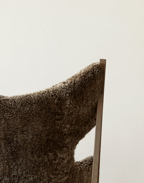 KNITTING armchair dark brown sheep leather with dark oak base