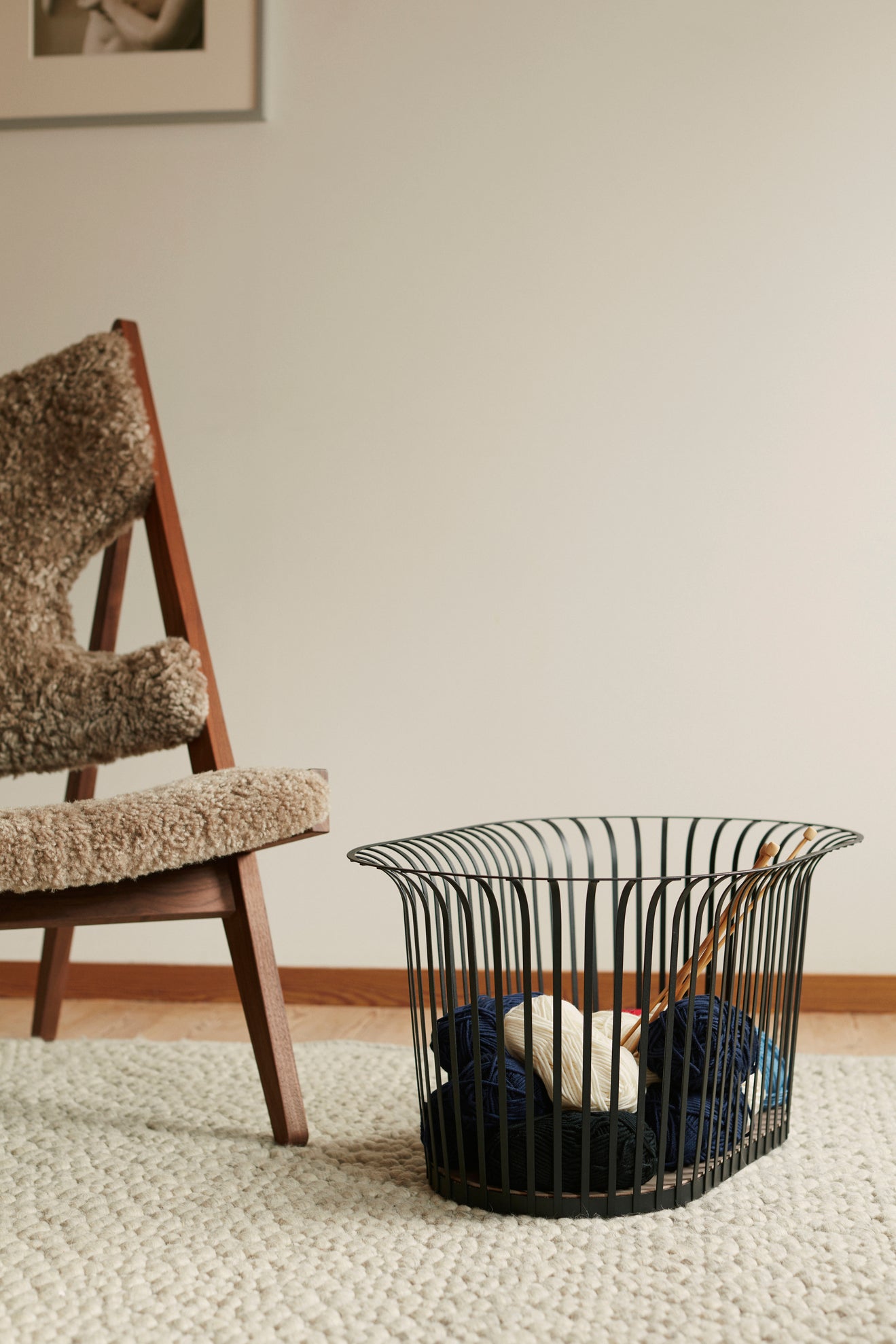 KNITTING armchair dark brown sheep leather with dark oak base