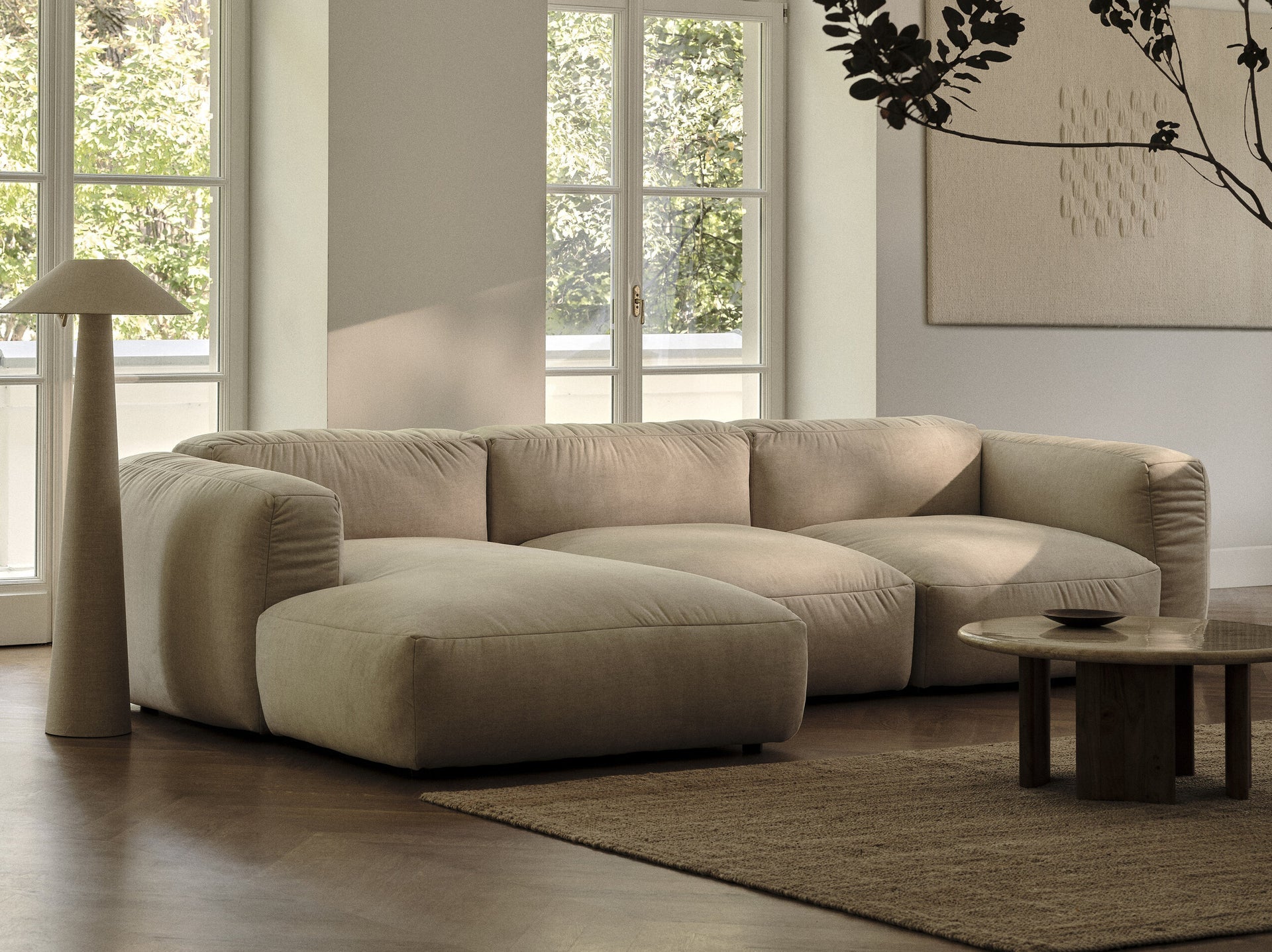 Left -handed velvet corner with a light beige Martin table