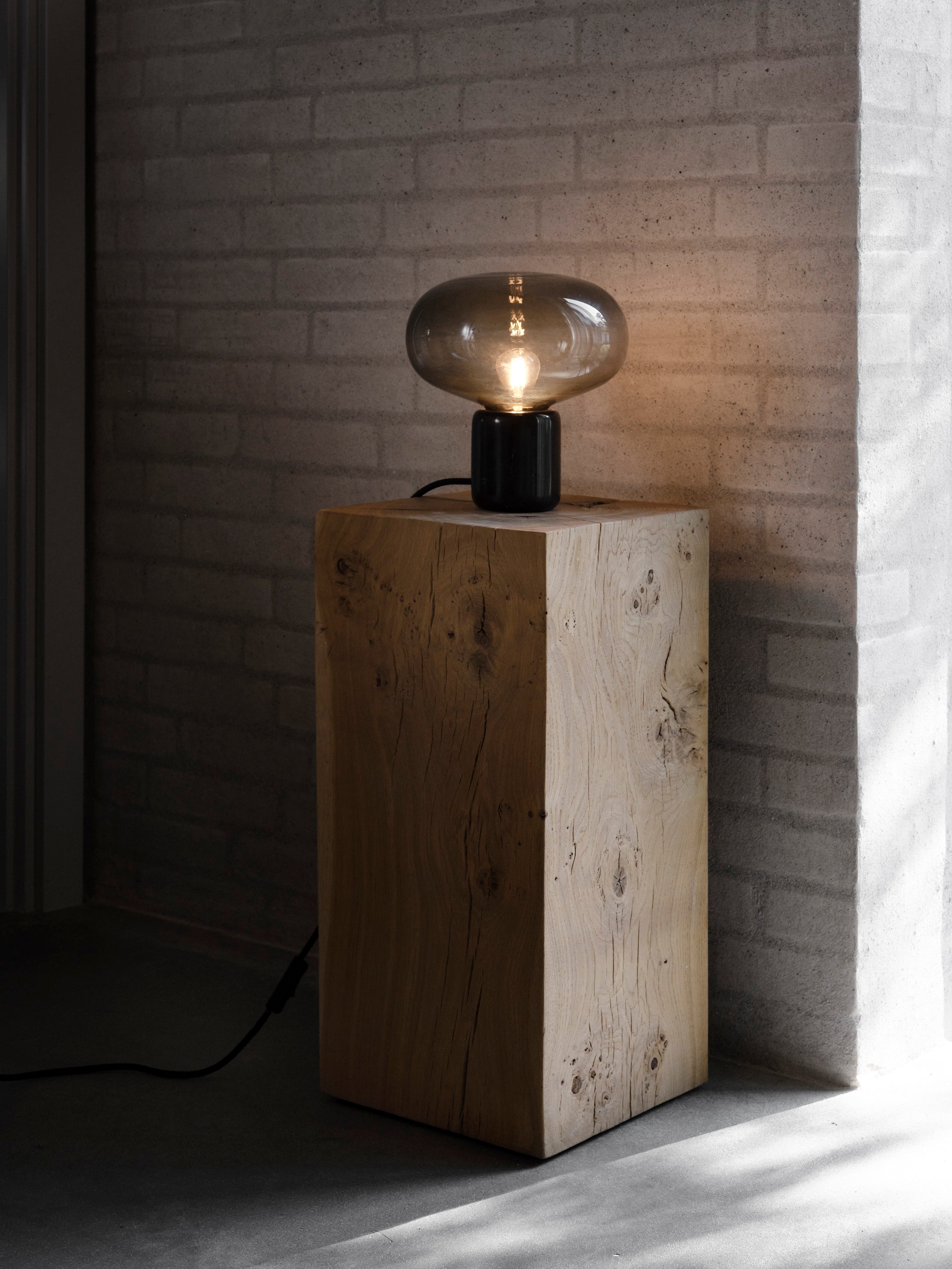 Karl-Johan table lamp smoked glass with a black marble base