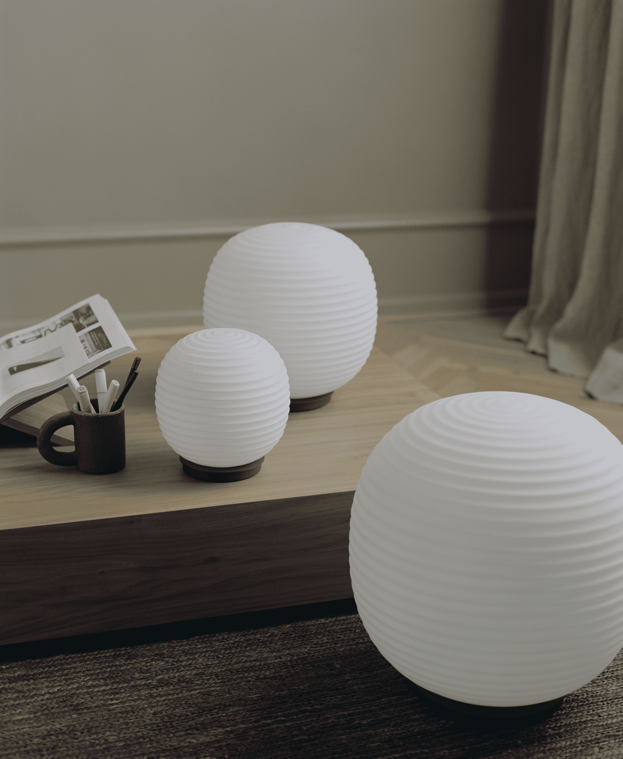Lantern Globe white table lamp with a black base