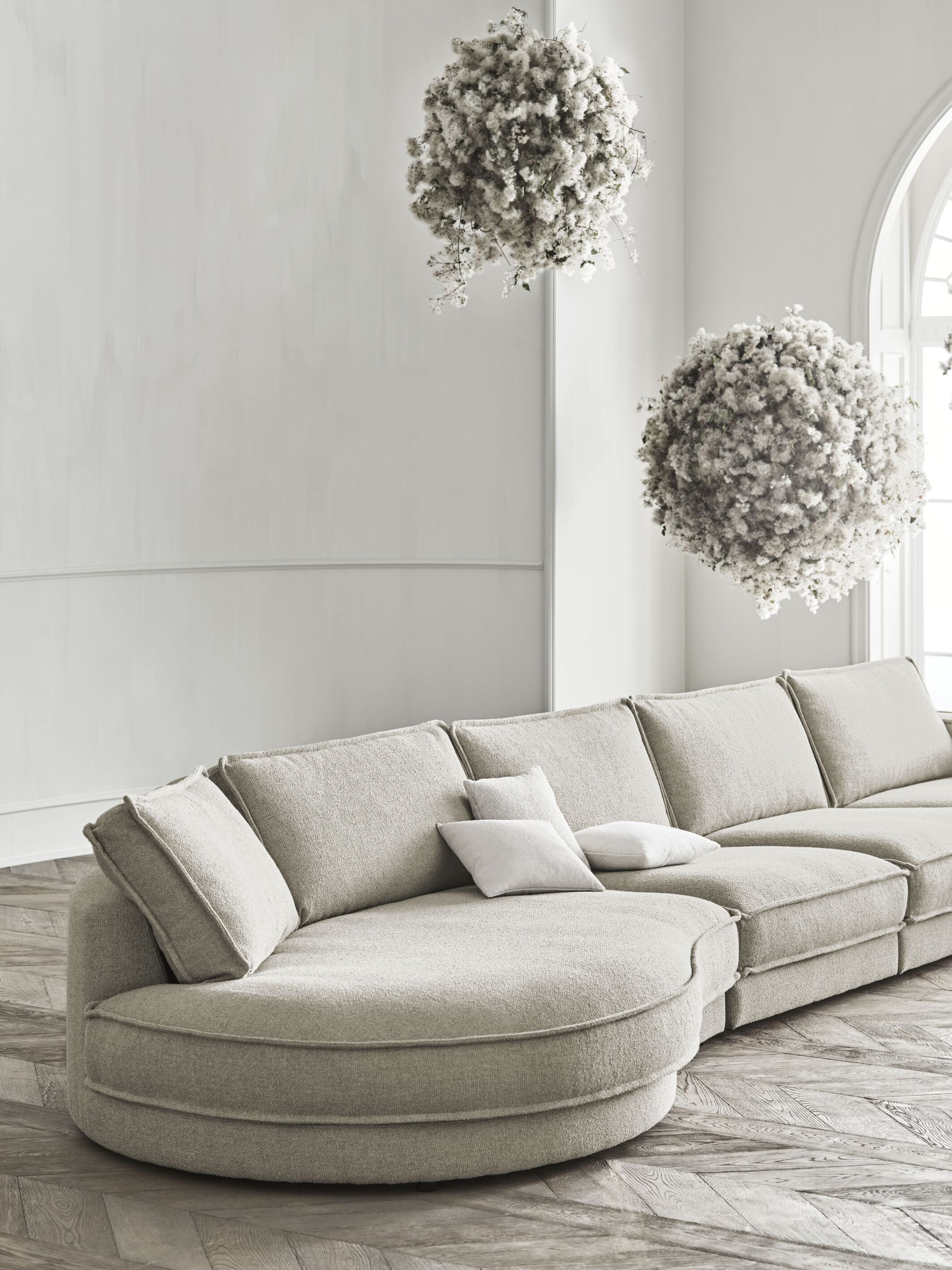 NOORA 3-module sofa with a rounded left side and an oak base