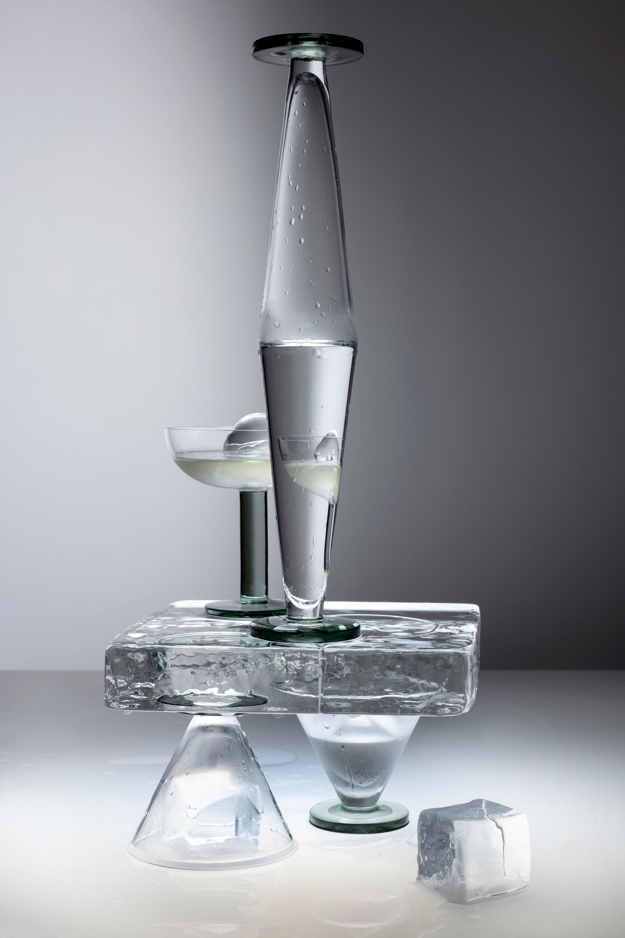 A set of Puck Flute glass champagne glasses